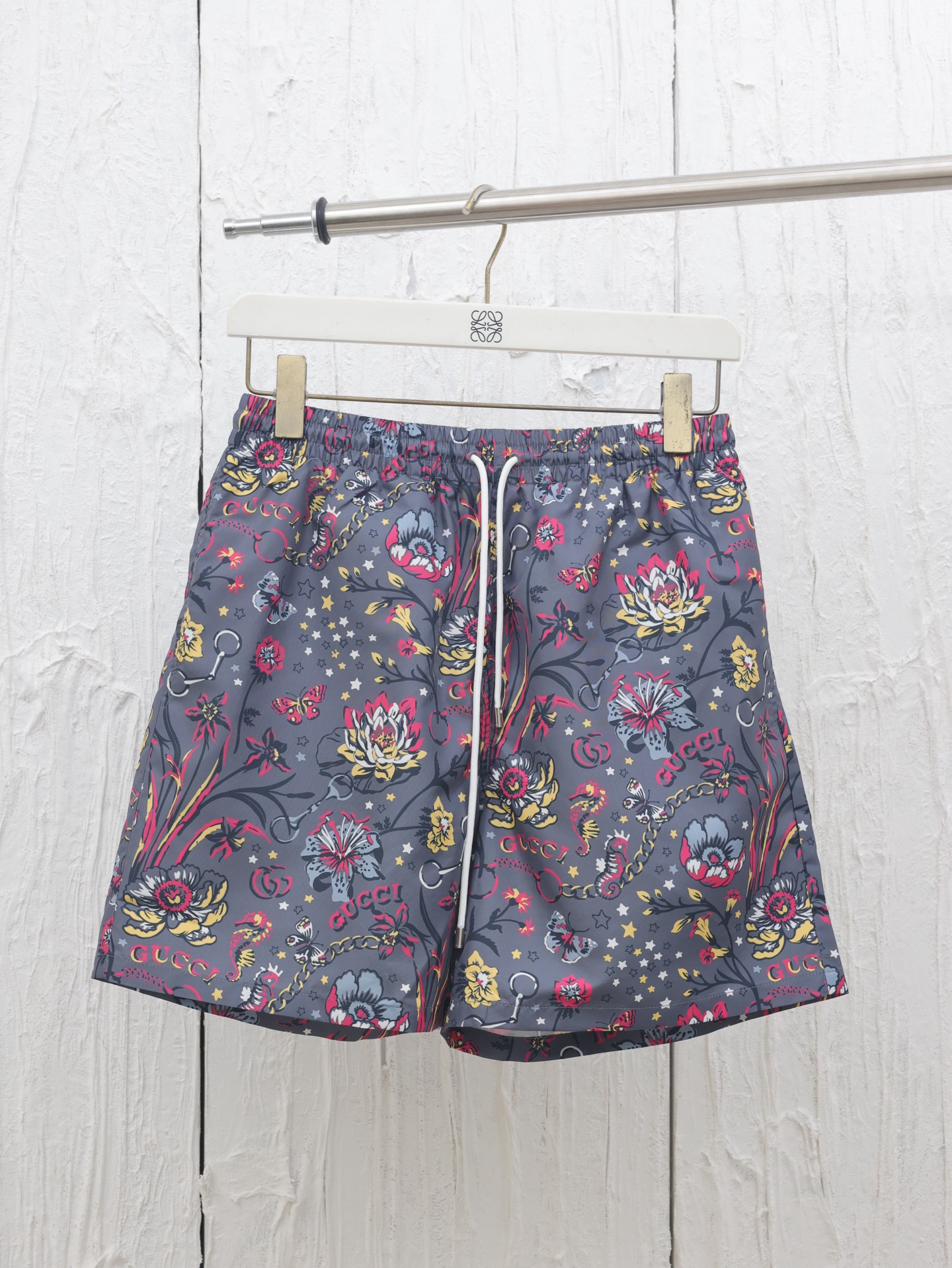 Gucc*/Gucci 25SS nueva temporada primavera-verano pantalones cortos deportivos de tejido casual, con estampado de flore…
