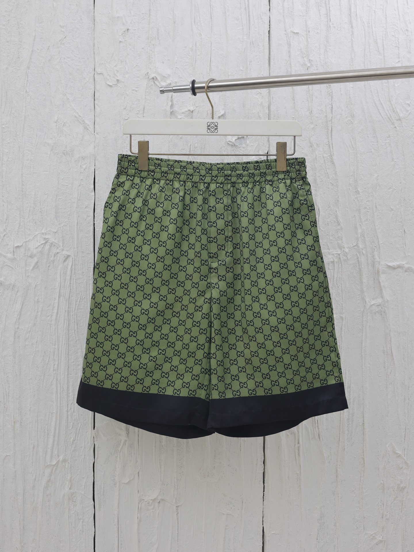 Gucci*/Gucci 25SS nueva colección de principios de otoño pantalones cortos de playa de seda deportivos, con patrón de d…