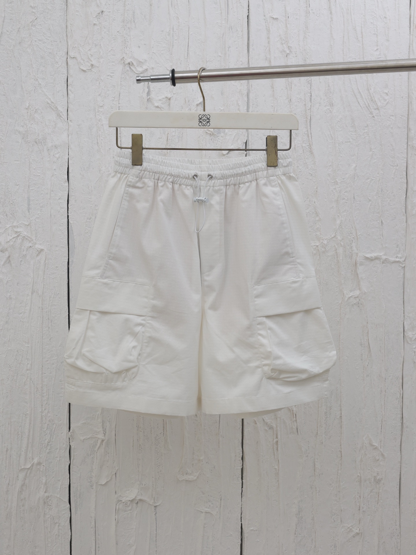 Gucci*/Gucci 25SS spring/summer new white casual sports shorts. Front diagonal pockets and flap large pockets, simple d…