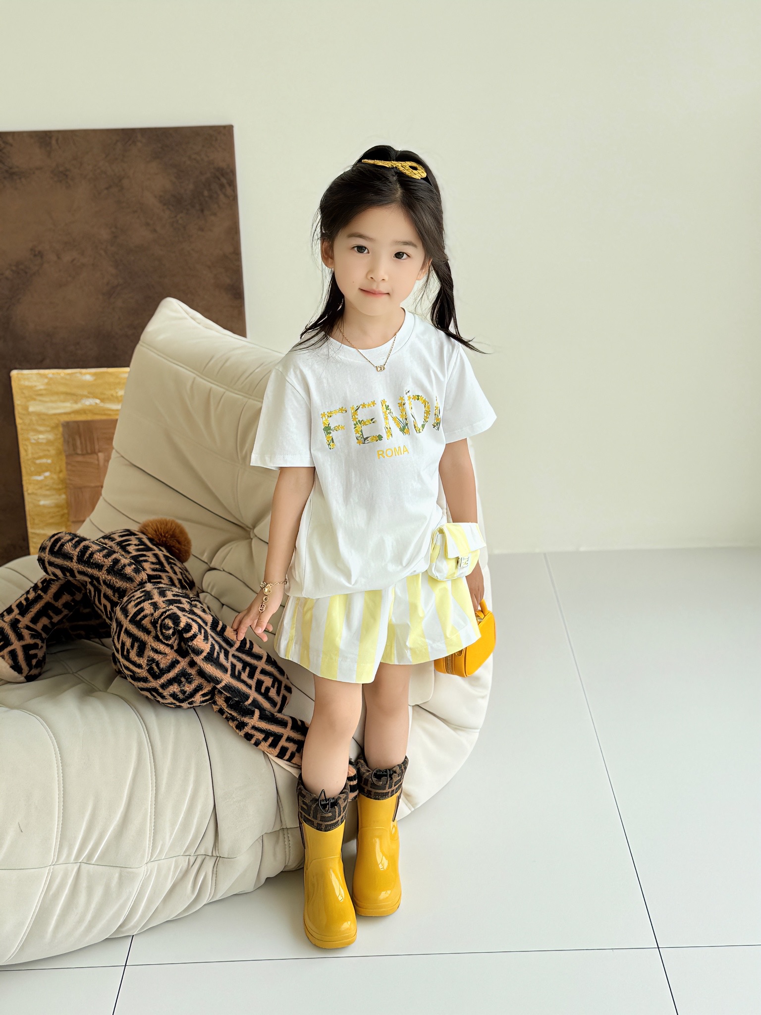 Fendi Kids White Floral Logo Tee and Yellow Striped Skirt Outfit 5 i1749039067000 7970 0 3