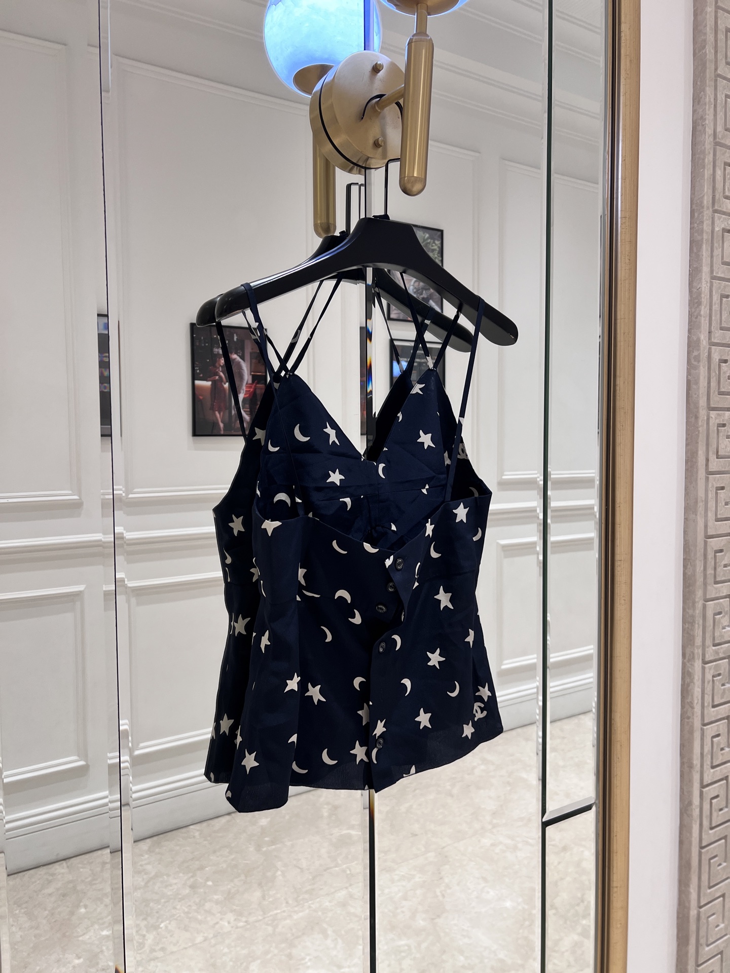 NO:873182,cha* star and moon print camisole, navy blue bottom with star and moon pattern, light and breathable fabric, perfect for summer!  V-neck + spaghetti strap design, open back and discreet, full of French niche feel. The short cut makes you taller and slimmer, and it looks great when paired with high-waisted pants or long skirts. It can be easily used for beach vacations, daily outings, and photo shoots. It is comfortable and fashionable, and is a must-have for summer wear!  SML.,Chanel-clothing,chanel,skirts,19860909cha*星月印花吊带背心,藏青色底配星星月亮图案,轻薄透气面料超适合夏天！V领+细肩带设计,露背小心机,法式小众感满满.短款剪裁显高显瘦,搭配高腰裤或长裙都很出片,海边度假、日常出街、拍照都能轻松驾驭,舒适又时髦,夏日穿搭必备！ SML.,香奈儿-服装,chanel,skirts,,Women's clothing