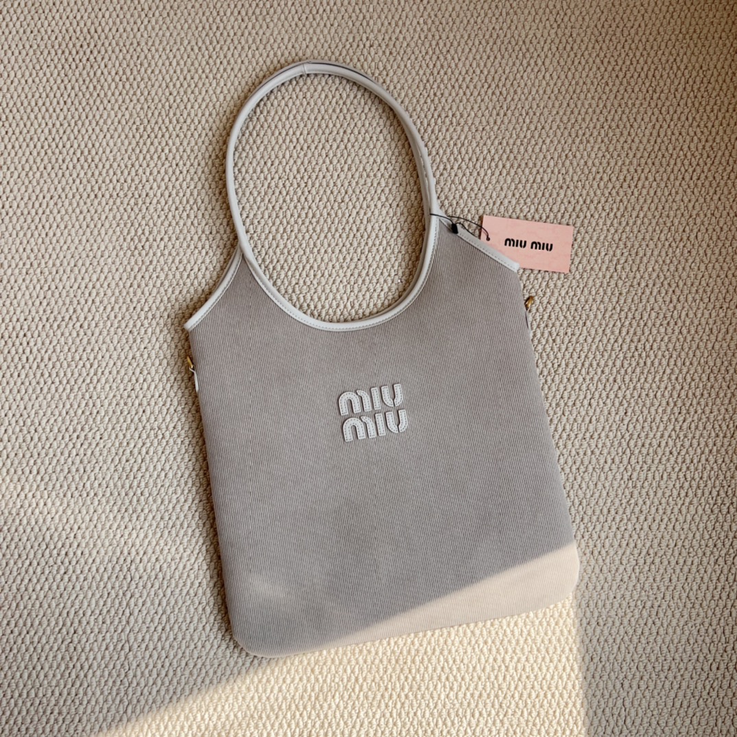 Miu Miu runway crescent tote bag crafted in corduroy - Comprehensive