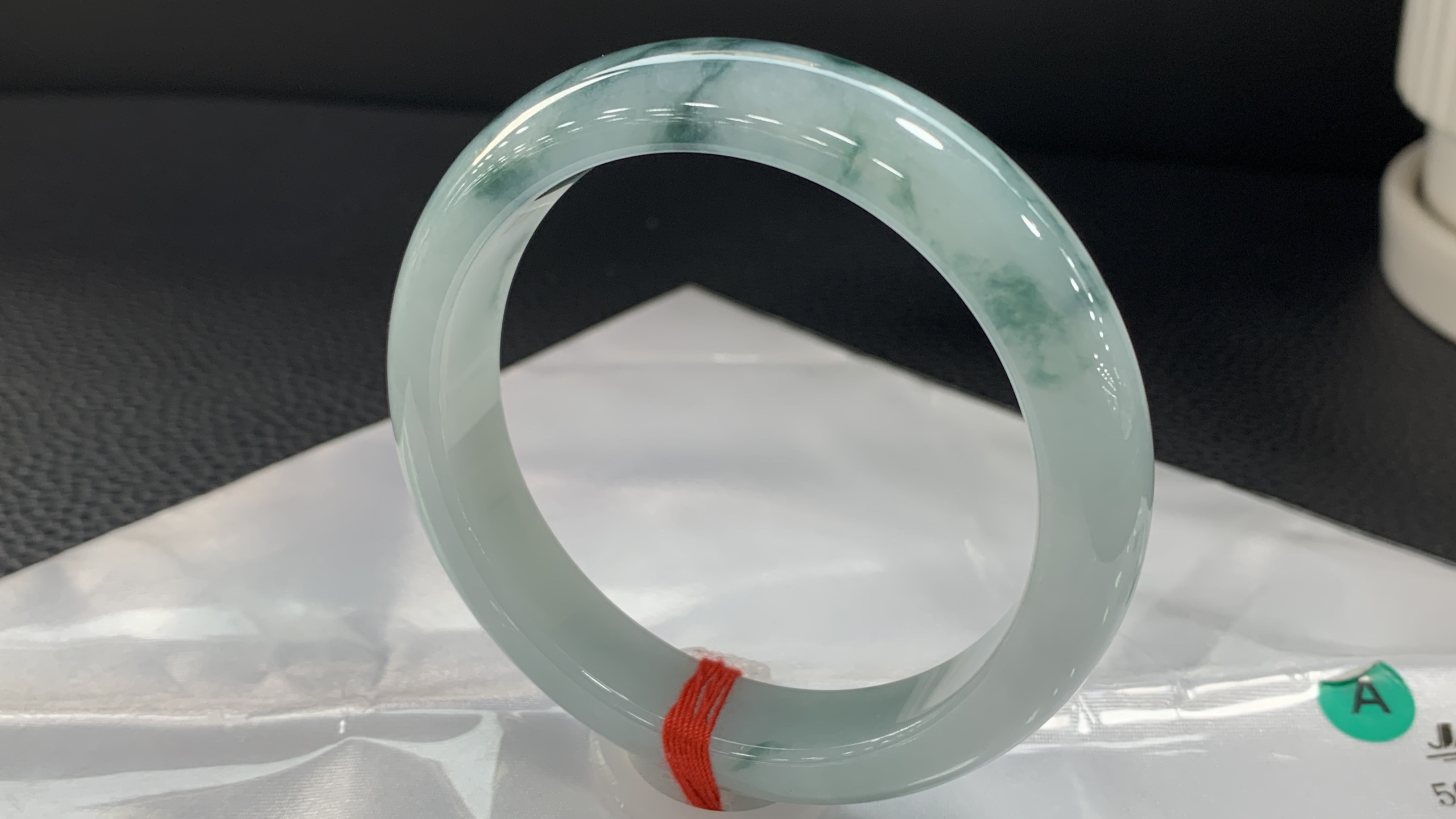 Clear base with floating blue floral pattern, Peaceful Bracelet 3