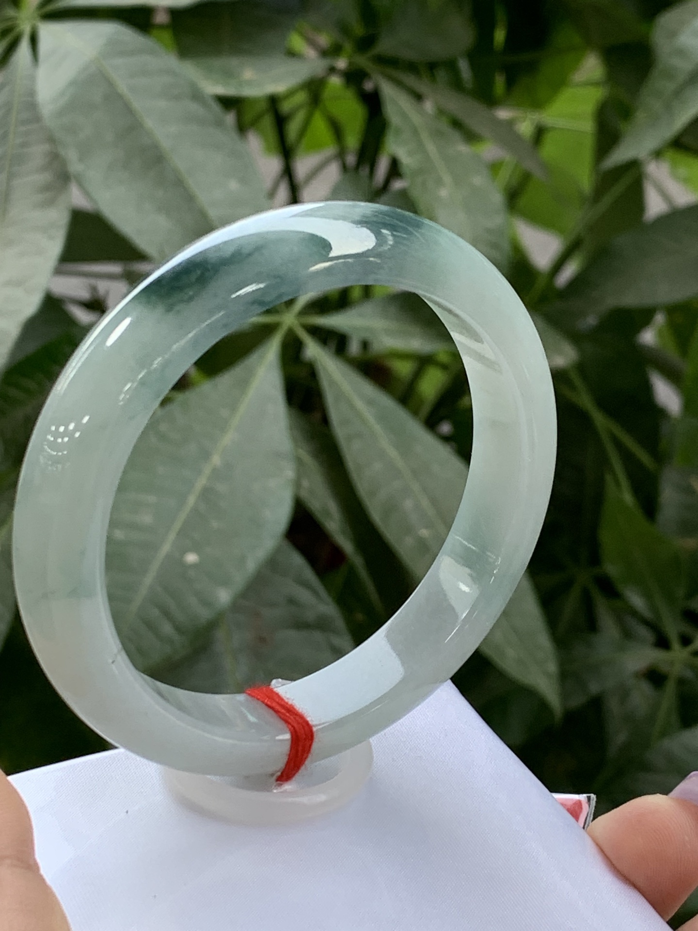 Clear base with floating green flowers, Peace bangle 2