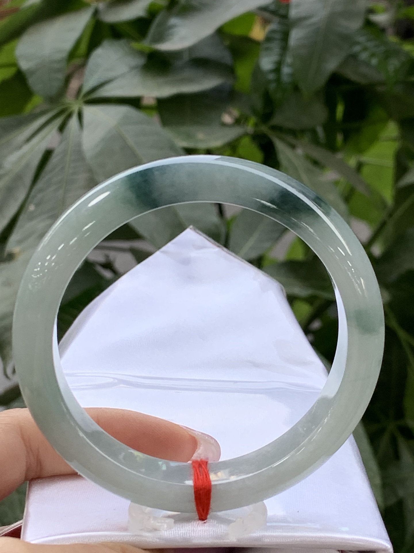 Clear base with floating green flowers, Peace bangle 4