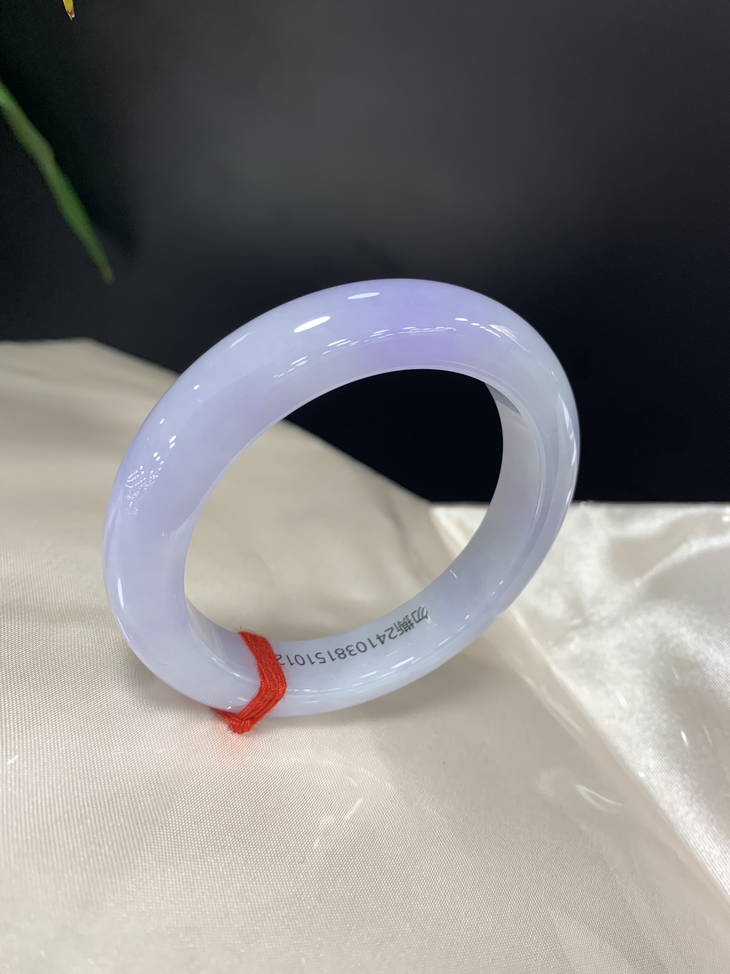 Authentic violet jadeite bangle with a petite inner diameter, smooth texture with subtle natural lines 4