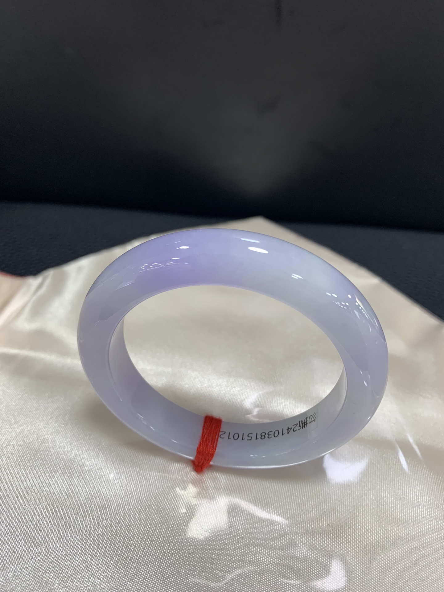 Authentic violet jadeite bangle with a petite inner diameter, smooth texture with subtle natural lines 3