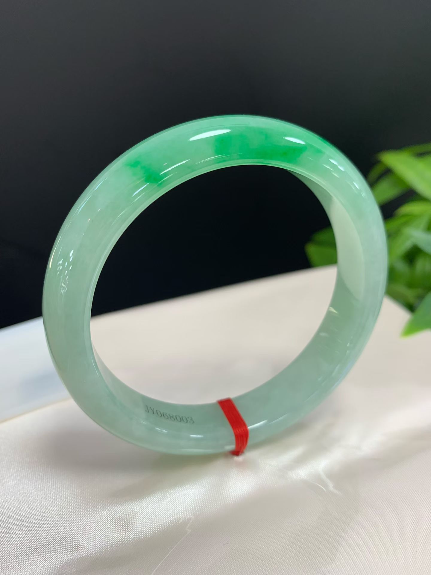 Clear base with floating green safety bangle 2