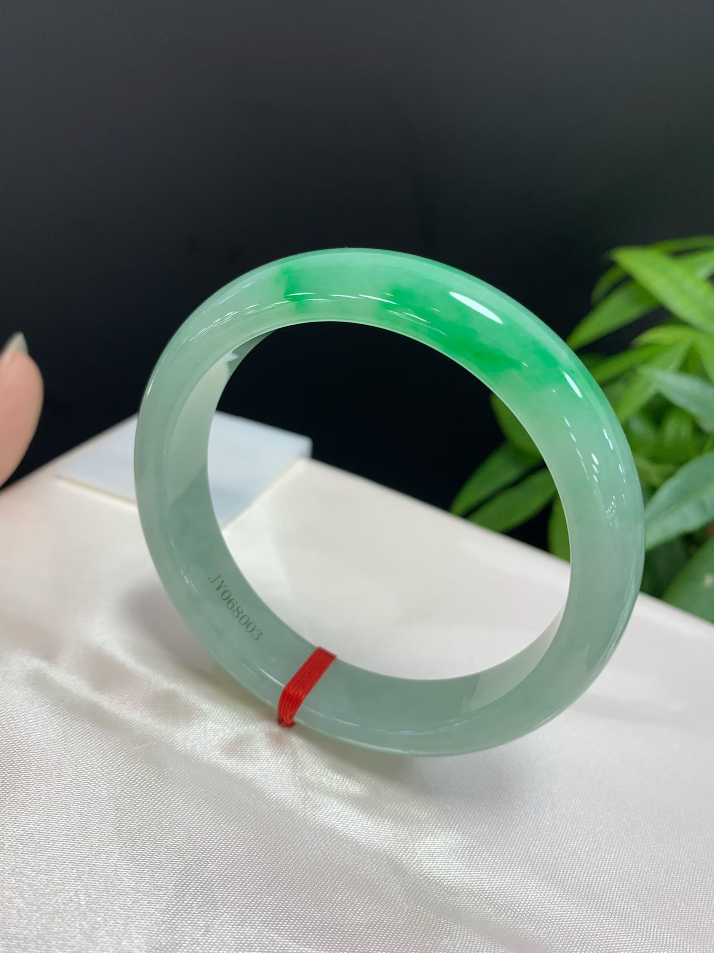 Clear base with floating green safety bangle 3