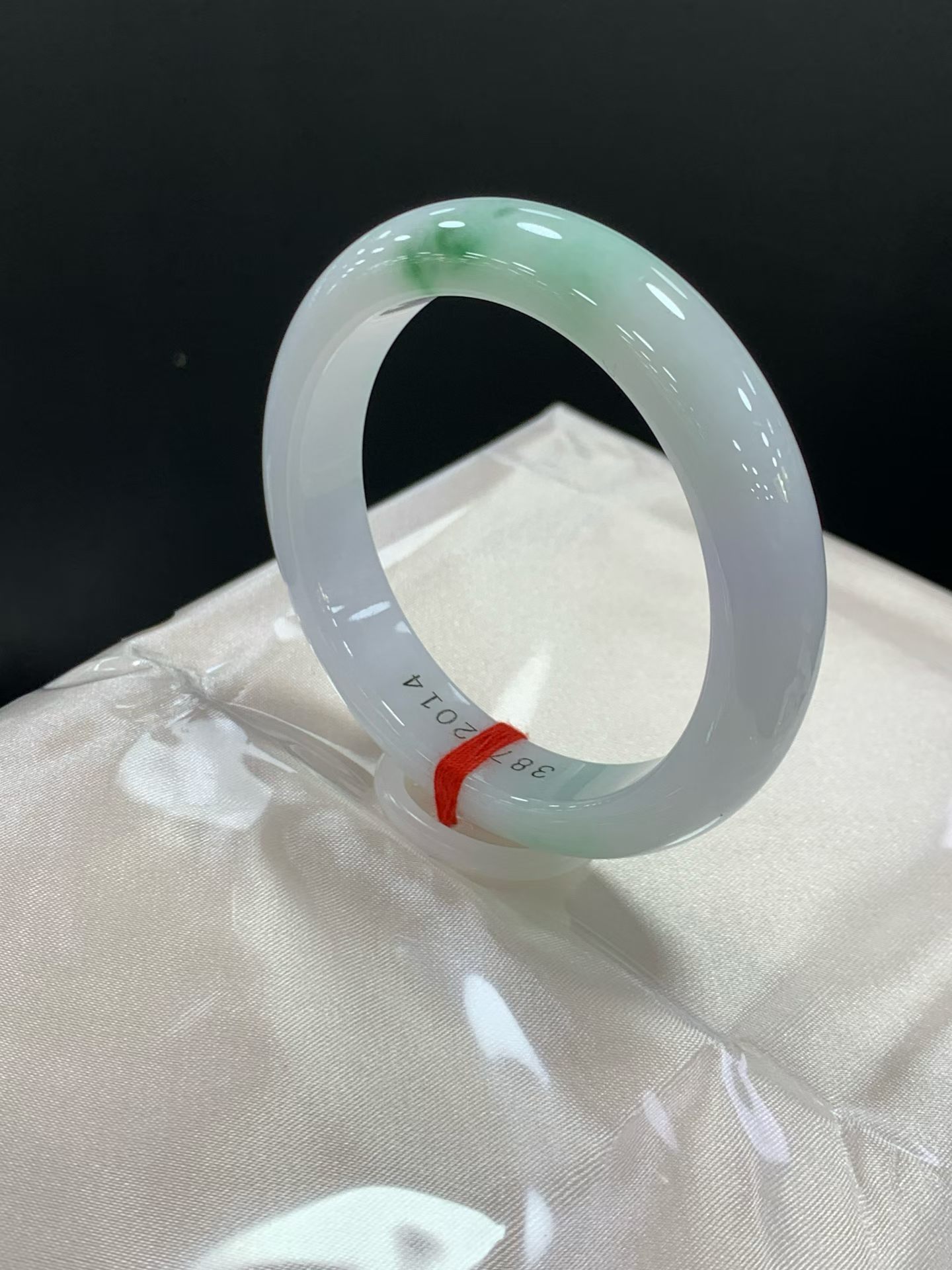 White background with green floral patterns, Peace Bangle 3