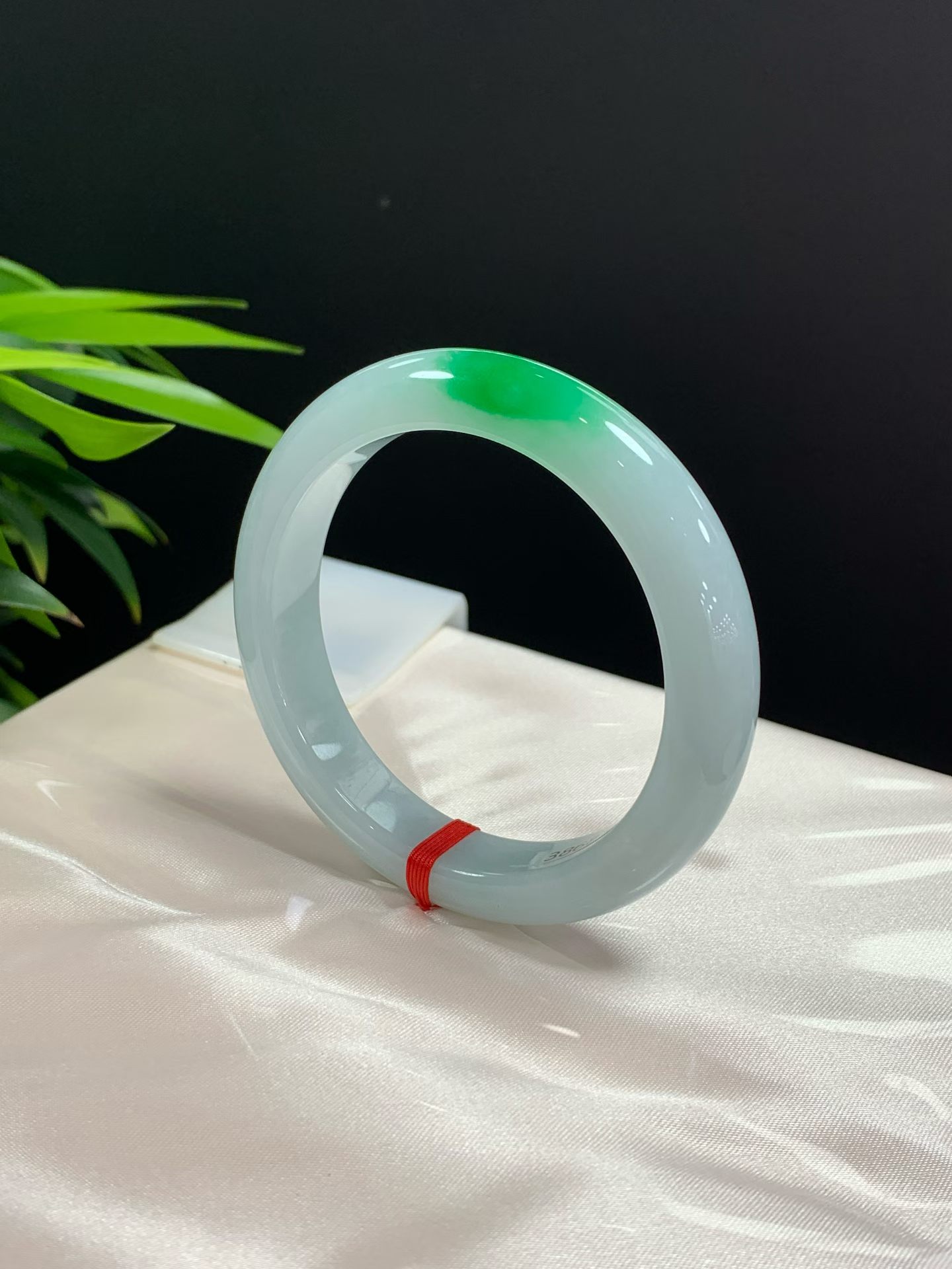 Clear base with green floating safety bangle