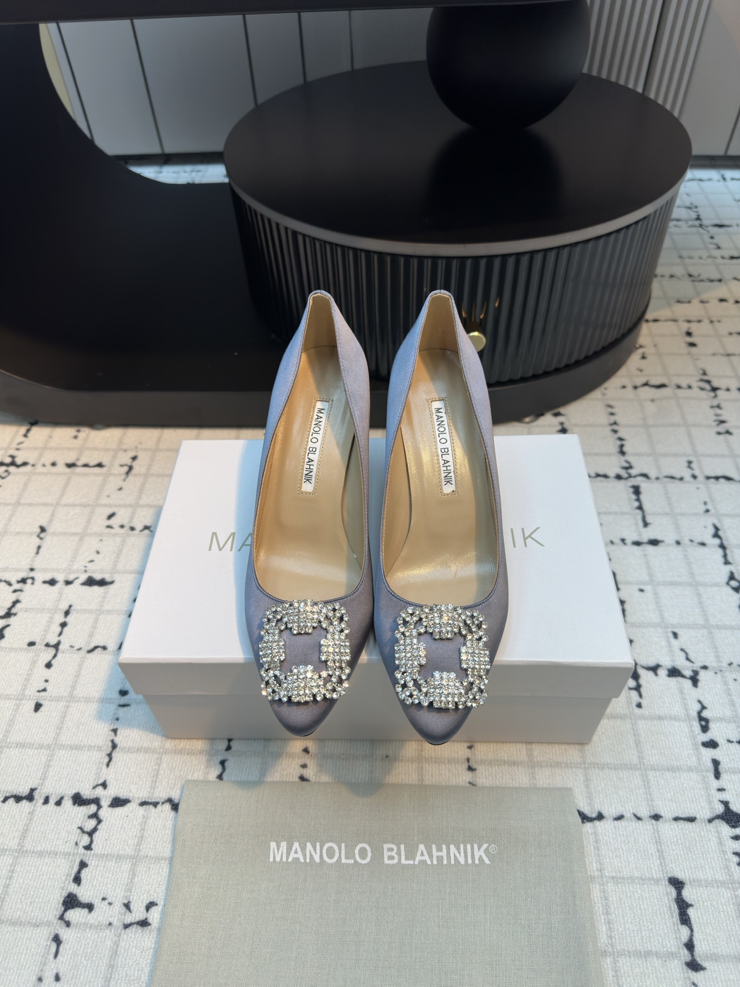 Manolo Blahnik’s Custom Silk Shoes: Quality and Perfection in Every Detail.