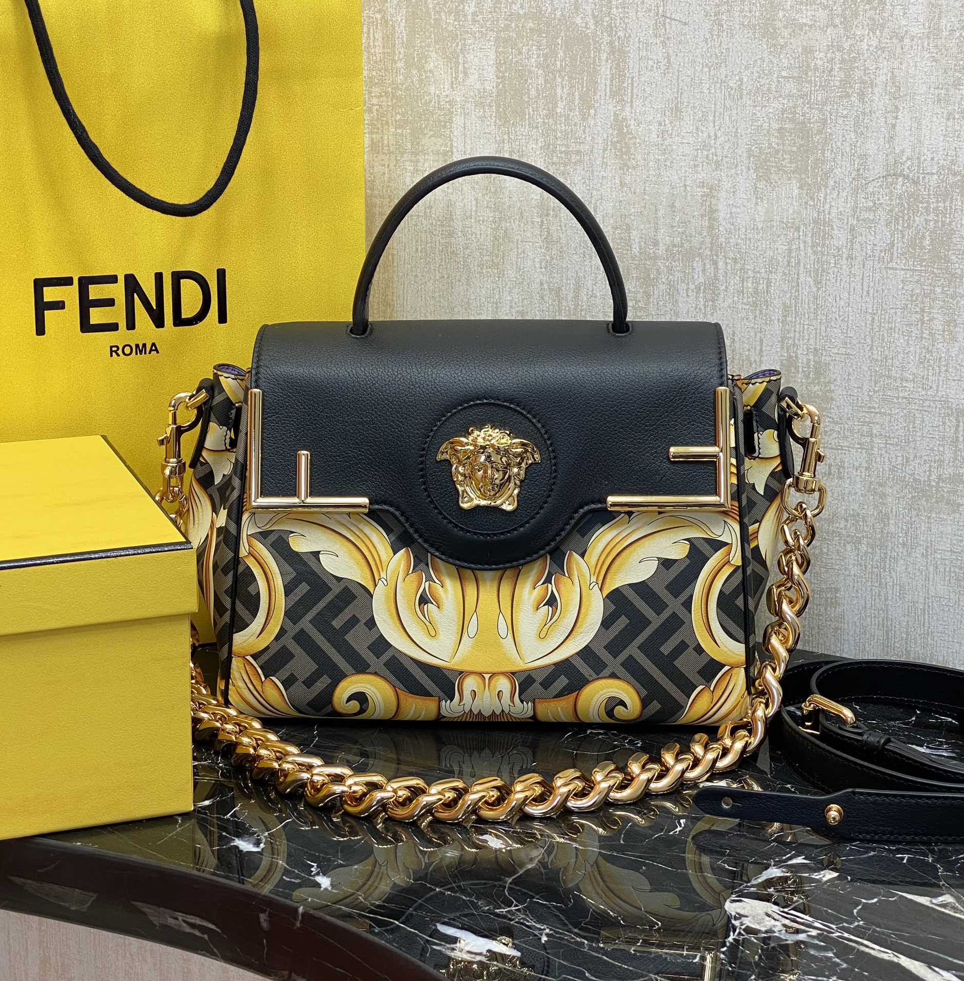 Fendi The most popular joint brand of the century, the versatile handbag can be carried by hand or worn cross-body using the interchangeable chai