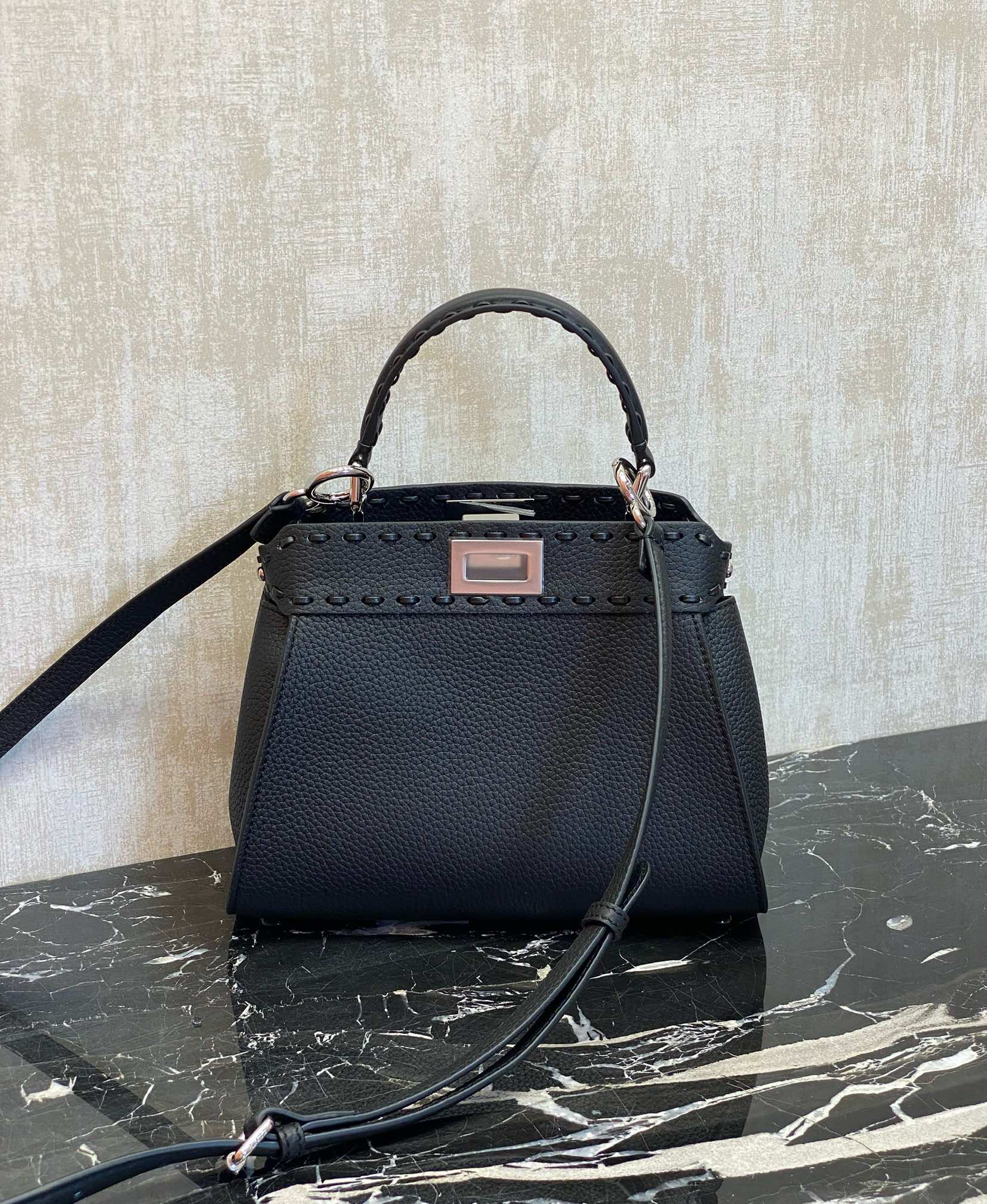 Fendi Peekaboo details: Black, Peekaboo, is a color that is suitable for all seasons, and will never go out of style. It has pebbled Roman calfsk