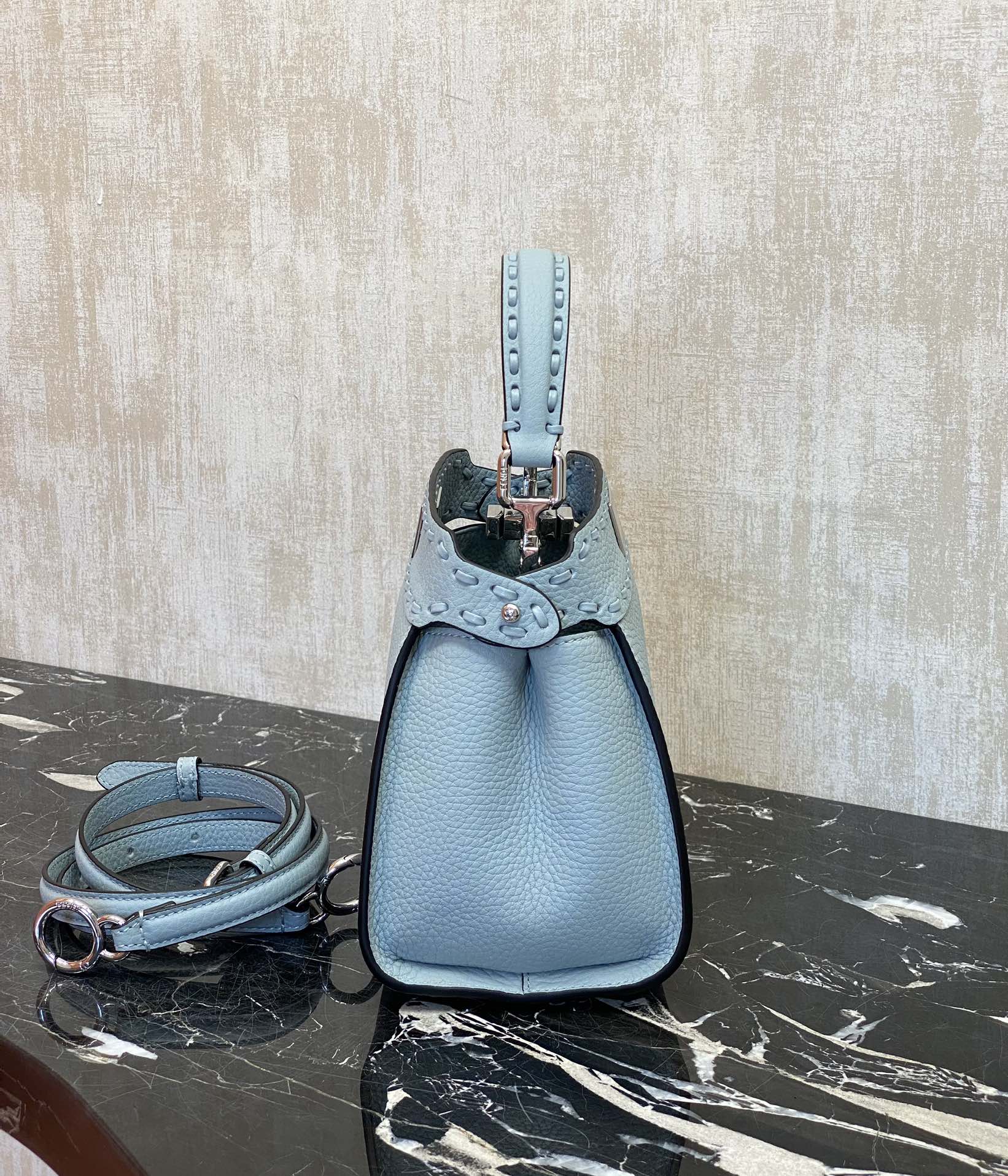 Fendi Details: Glacier blue, Peekaboo, is a color that is suitable for all seasons and will never go out of style. Lychee Roman calfskin outer st
