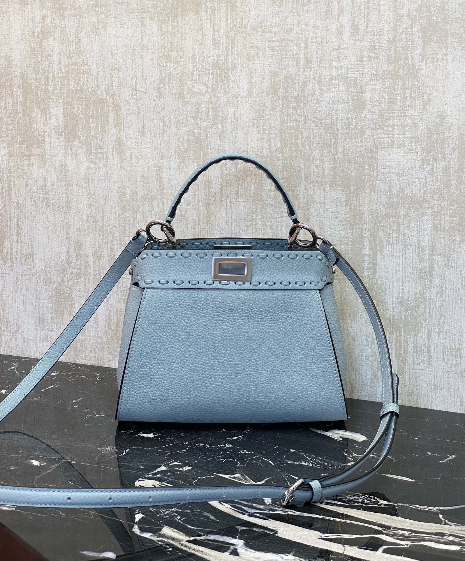 Fendi Details: Glacier blue, Peekaboo, is a color that is suitable for all seasons and will never go out of style. Lychee Roman calfskin outer st