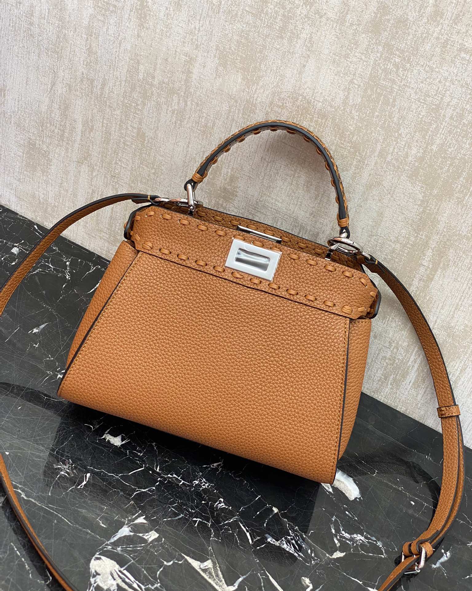 Fendi Details: Caramel color, Peekaboo, is a color that is suitable for all seasons and will never go out of style. It has pebbled Roman calfskin