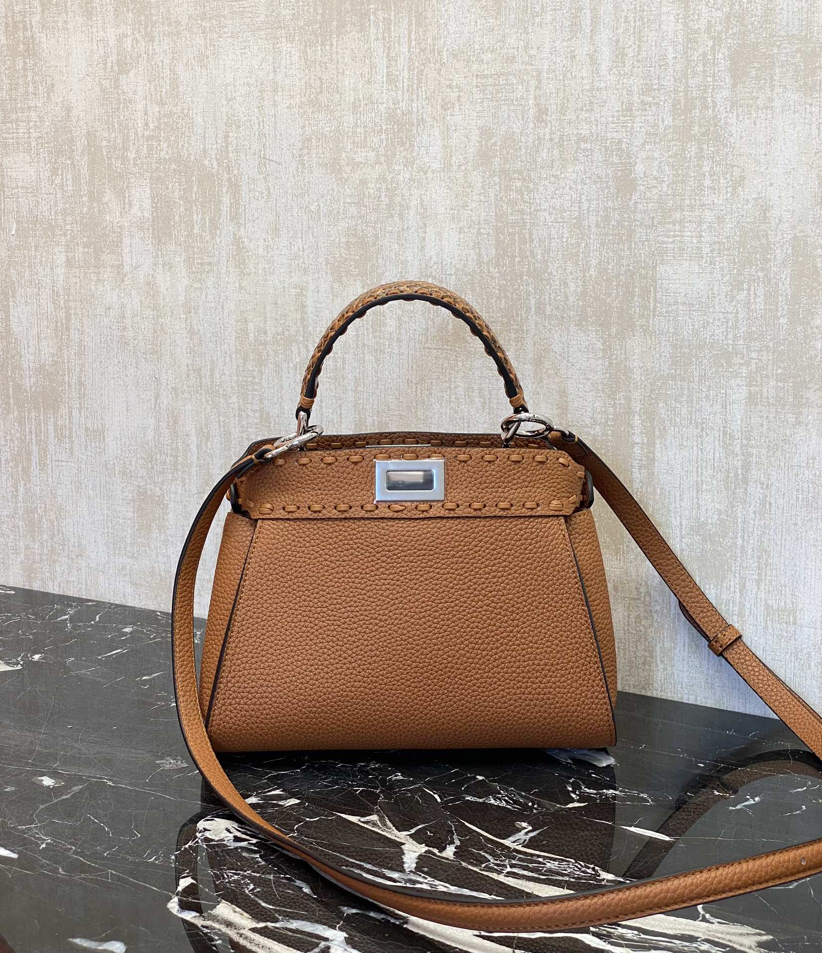 Fendi Details: Caramel color, Peekaboo, is a color that is suitable for all seasons and will never go out of style. It has pebbled Roman calfskin