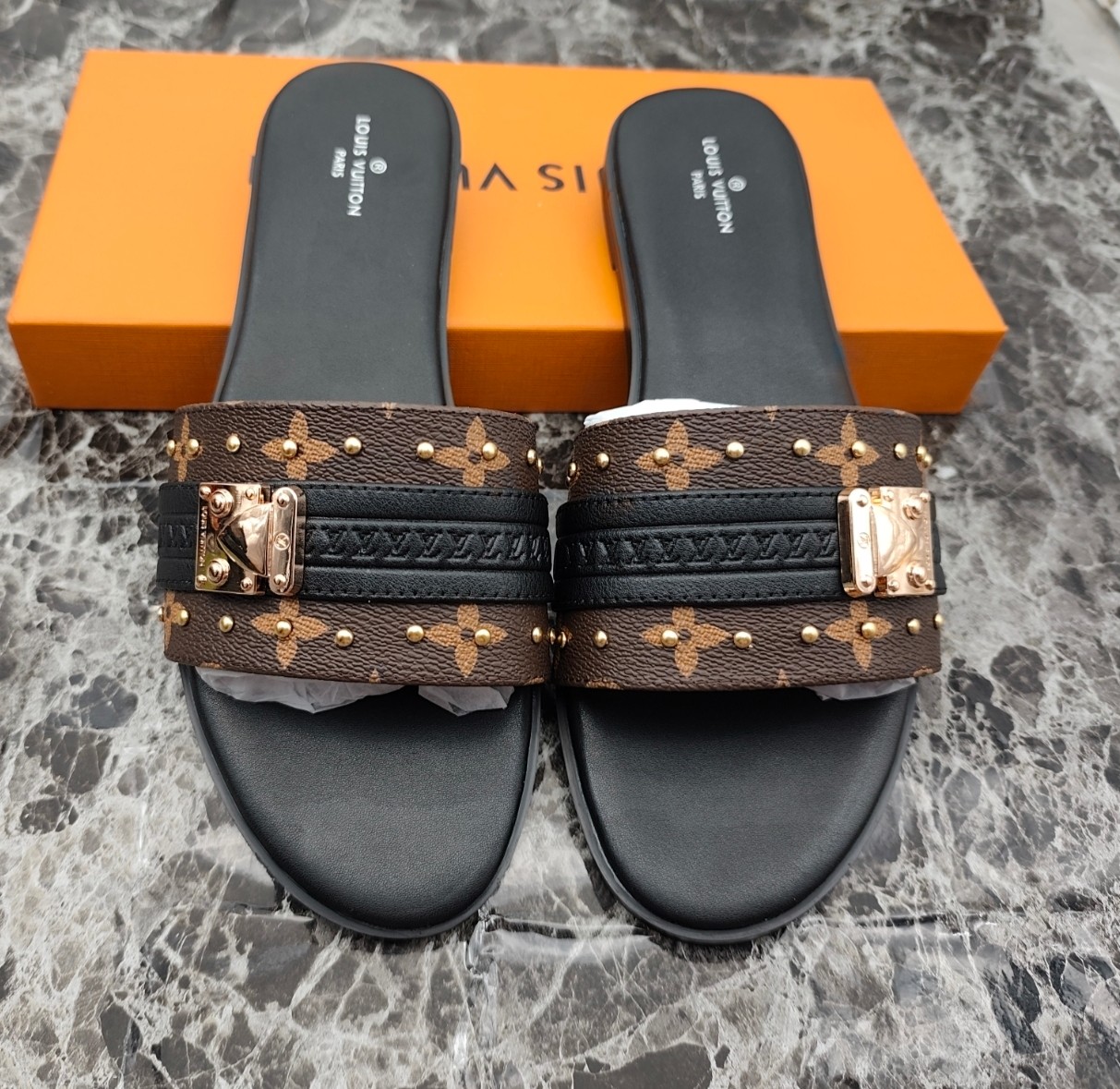 Louis Vuitton Lock It Flat Mules Sandals in Monogram Canvas 3 a1744363052478 3066