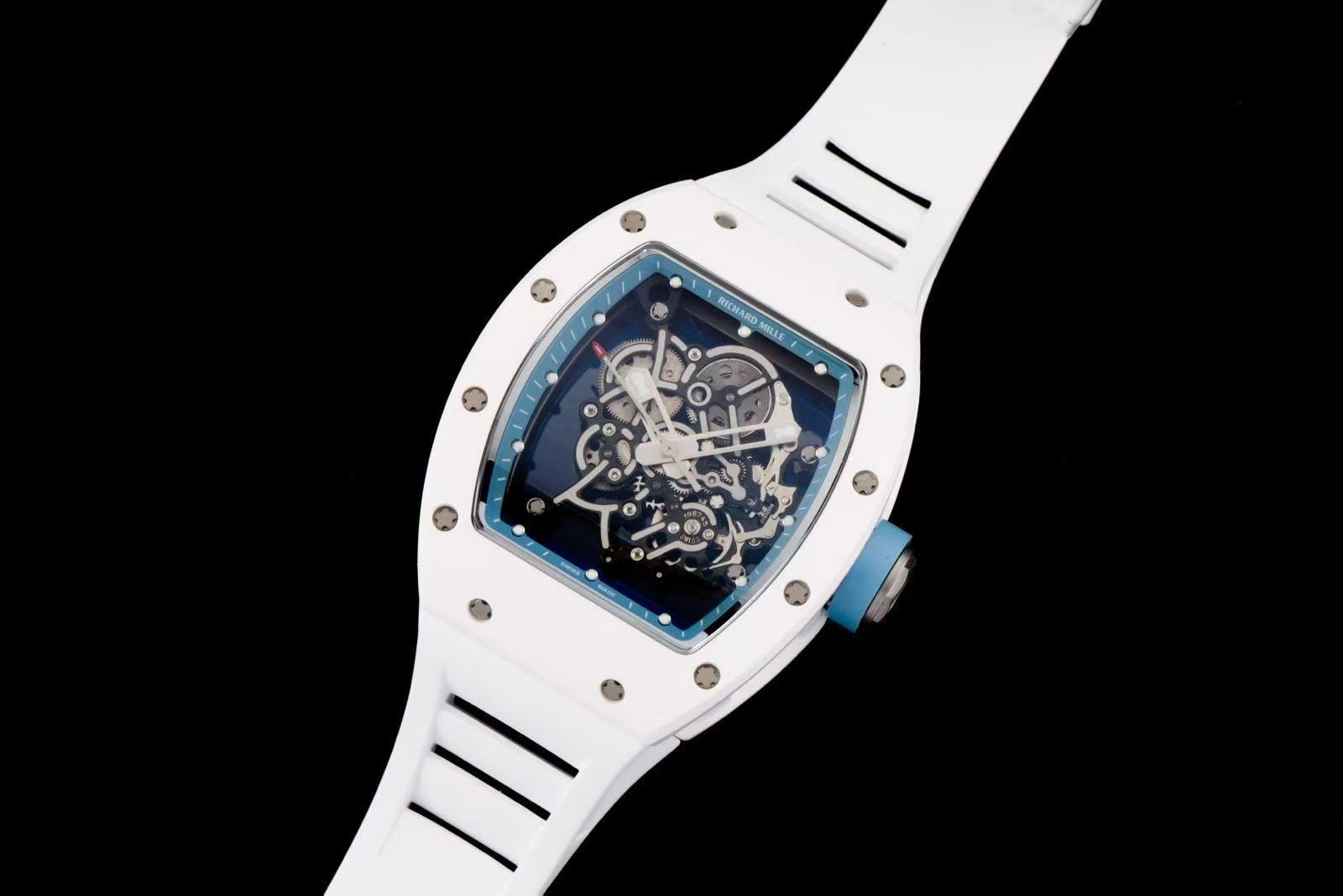 NO:384214,Factory D Richard Mill RM 'Ceramics' series is on the market!  1. The upper cover is made of ceramic material, the middle frame and the back cover are made of real titanium alloy wrapped in fluoroelastic rubber, and the original design is synchronized. 2. The original data shell is used. The curved curve of the case at the strap interface is the original version. 3. The high-transparent sapphire crystal glass is used. The 'blue-coated film' effect is faintly visible, and it is the same as the blue film effect of the original version. 4. The unique 'glass edge reflective strip' design of the RM ceramic model 5. The crown is made of titanium alloy, and the color is titanium alloy 6. The clasp is made of titanium alloy, and the shape, engraving, and sanding effects are the same as the original version. 7. The 'logo' on the back cover of the titanium alloy wrapped in rubber is used. 8. The cost-effectiveness is very good. The modification watch is originally priced at 'ten thousand' on the market.19860909D厂理查米尔RM“陶瓷”系列上市啦！ 1,采用“原版数据壳”,上盖采用陶瓷材质,中框和后盖采用真钛合金包裹氟橡胶制作而成,同步原装的设计, 2,采用原版数据壳,表壳在表带接口处的弯曲弧度是对版原装的 3,采用高透蓝宝石水晶玻璃,“镀蓝膜”效果若隐若现,和原装陶瓷款的蓝膜效果一样 4,RM陶瓷款独特的“玻璃边缘反光条”设计 5,”表冠“为钛合金材质,颜色是钛合金 6,”表扣“为钛合金材质,在形状,刻字,拉沙效果都均和原装保持一致 7,钛合金包裹橡胶的后盖上面的”logo'对版原装 8,极具的性价比,改装表原来市场上都是要“大几万”的价位,,Watch