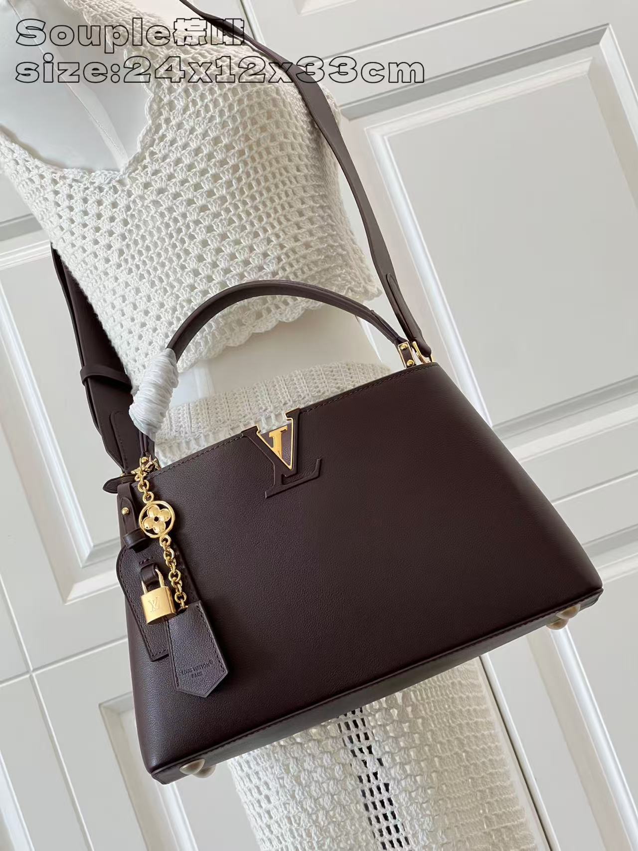 Louis Vuitton Souple Brown Leather Handbag, 24 x 12 x 33 cm