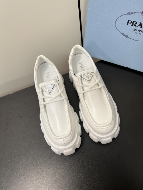 Prada White Leather Lug-Sole Loafers with Iconic Triangle Logo 1 Prada White Leather Lug-Sole Loafers with Iconic Triangle Logo