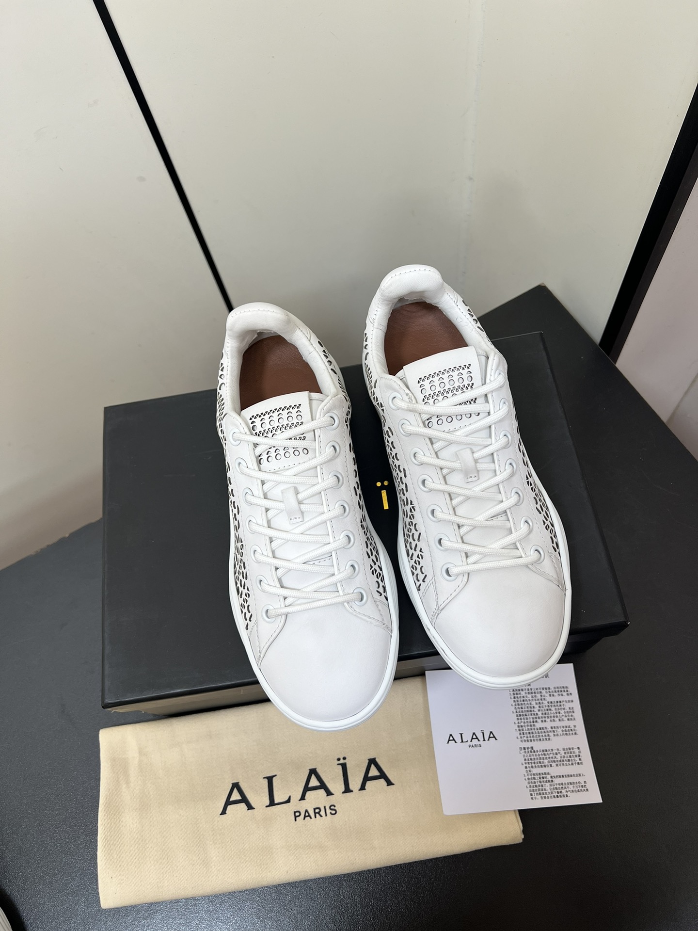 Alaia White Sneakers with Laser-Cut “Vienne” Pattern for Comfort and Elegance