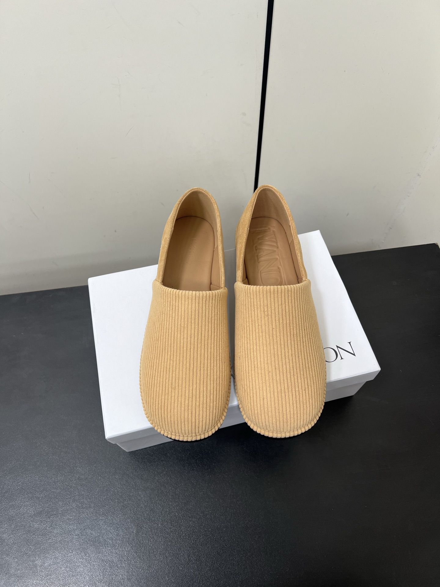 JW Anderson’s Simple Slashed Bluff Shoes: Natural, Clean, and Practical