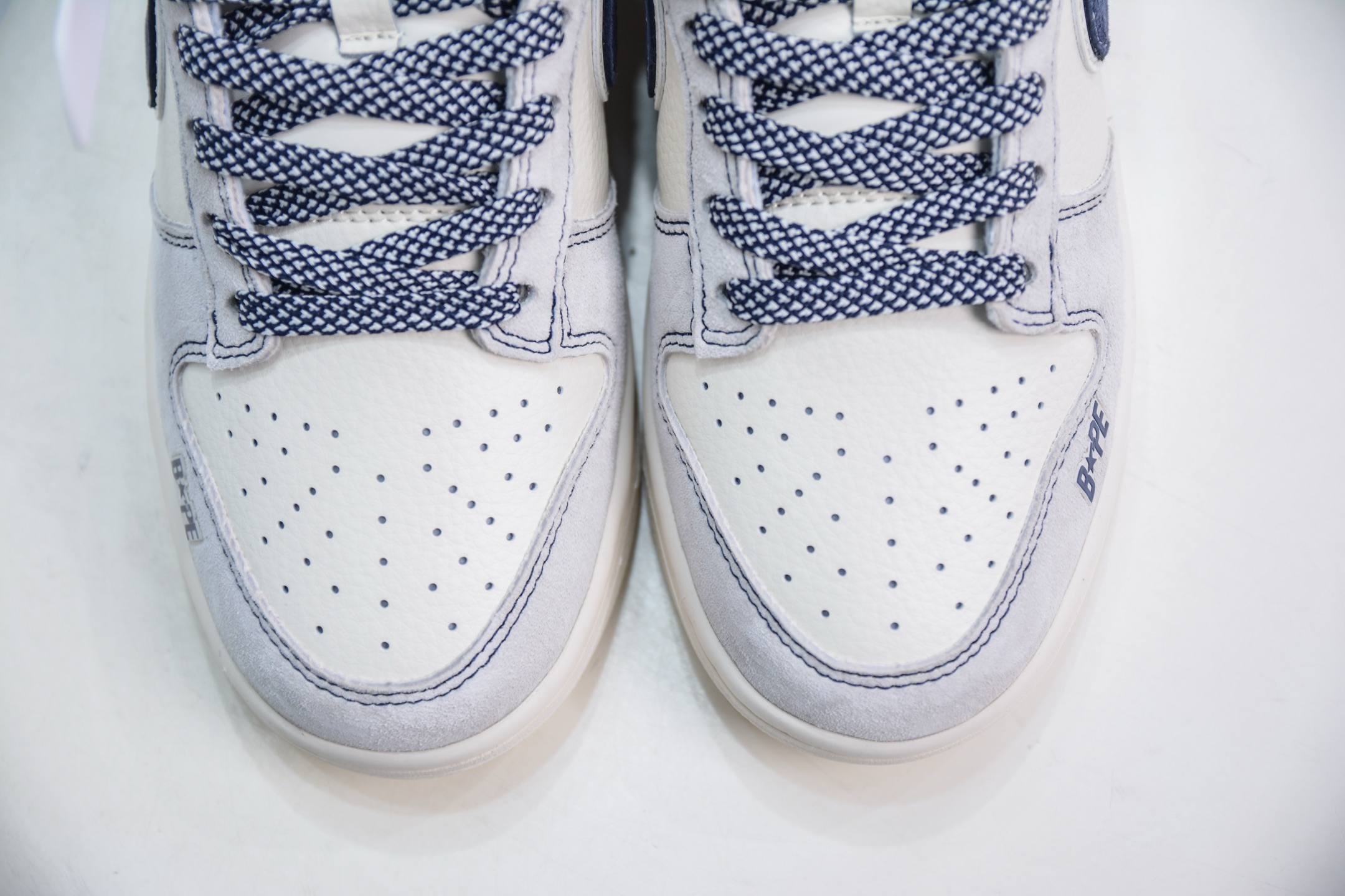280   Nike SB Dunk Low x BAPE 猿人头联名-白蓝双勾  SJ2558-018