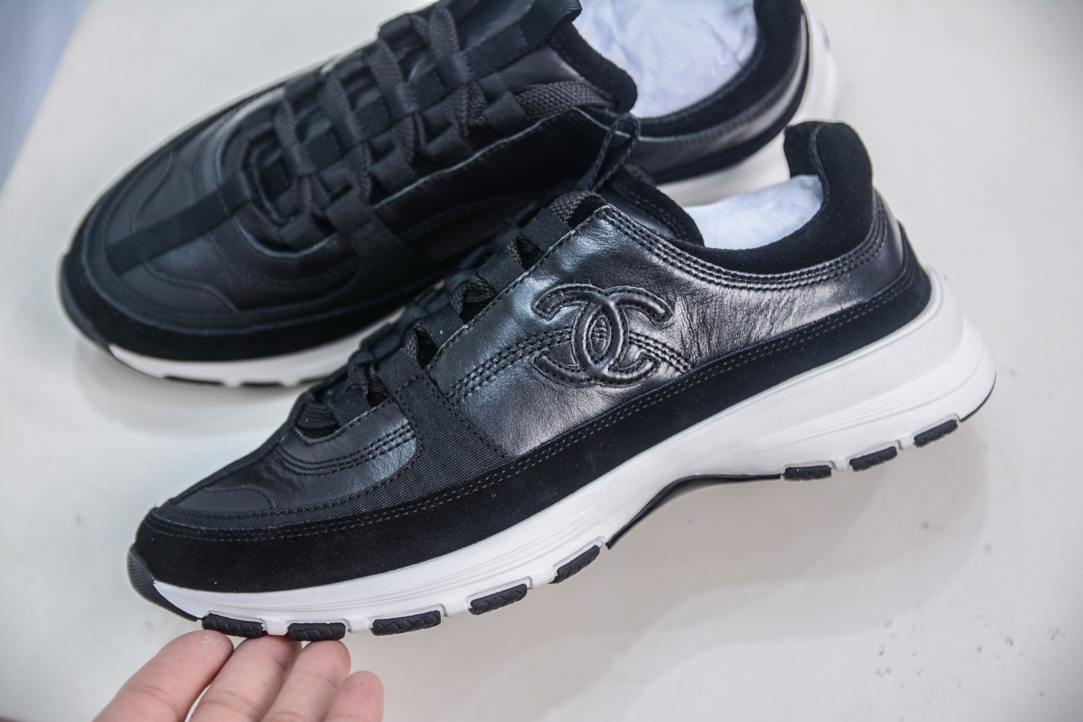 Chanel Women's Black Leather & Suede Sneakers With Iconic CC Logo 8 i1754845907778 7146 0 6