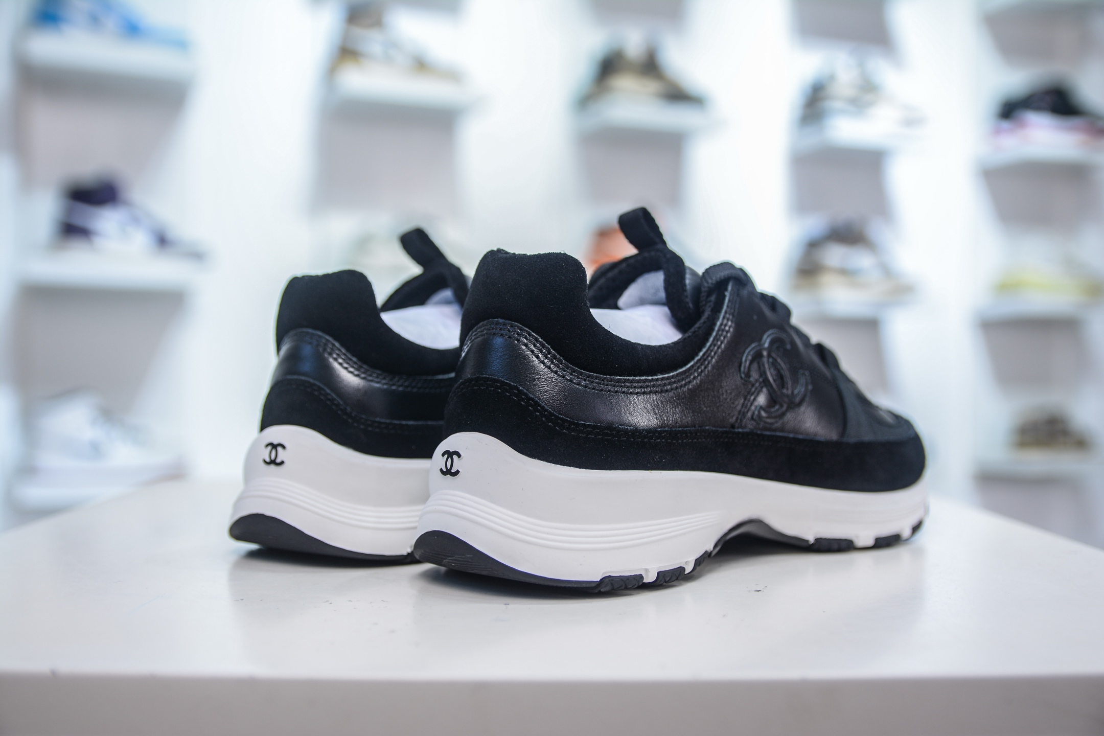 Chanel Women's Black Leather & Suede Sneakers With Iconic CC Logo 7 i1754845909396 6600 0 5