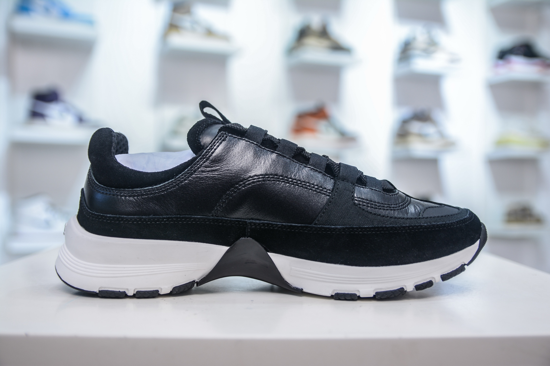 Chanel Women's Black Leather & Suede Sneakers With Iconic CC Logo 4 i1754845909435 294 0 2