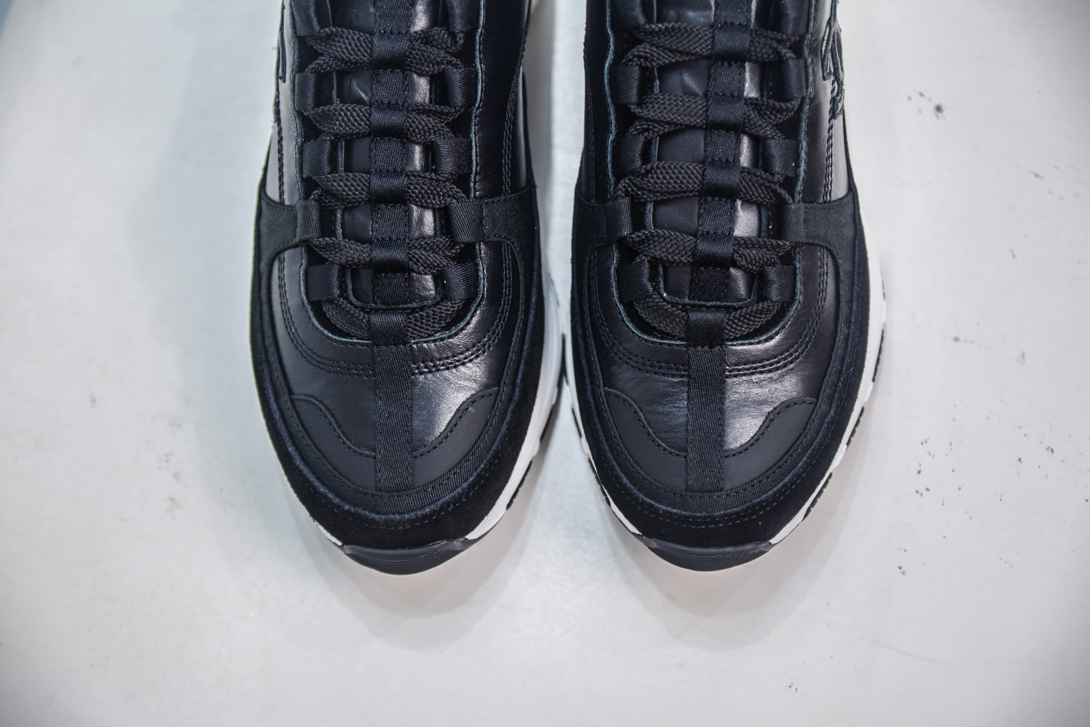 Chanel Women's Black Leather & Suede Sneakers With Iconic CC Logo 10 i1754845909461 4468 0 8