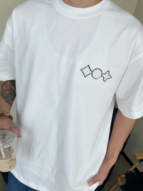 White Cotton Louis Vuitton T-Shirt with Embroidered Candy Logo - Casual Style 1 White Cotton Louis Vuitton T-Shirt with Embroidered Candy Logo - Casual Style