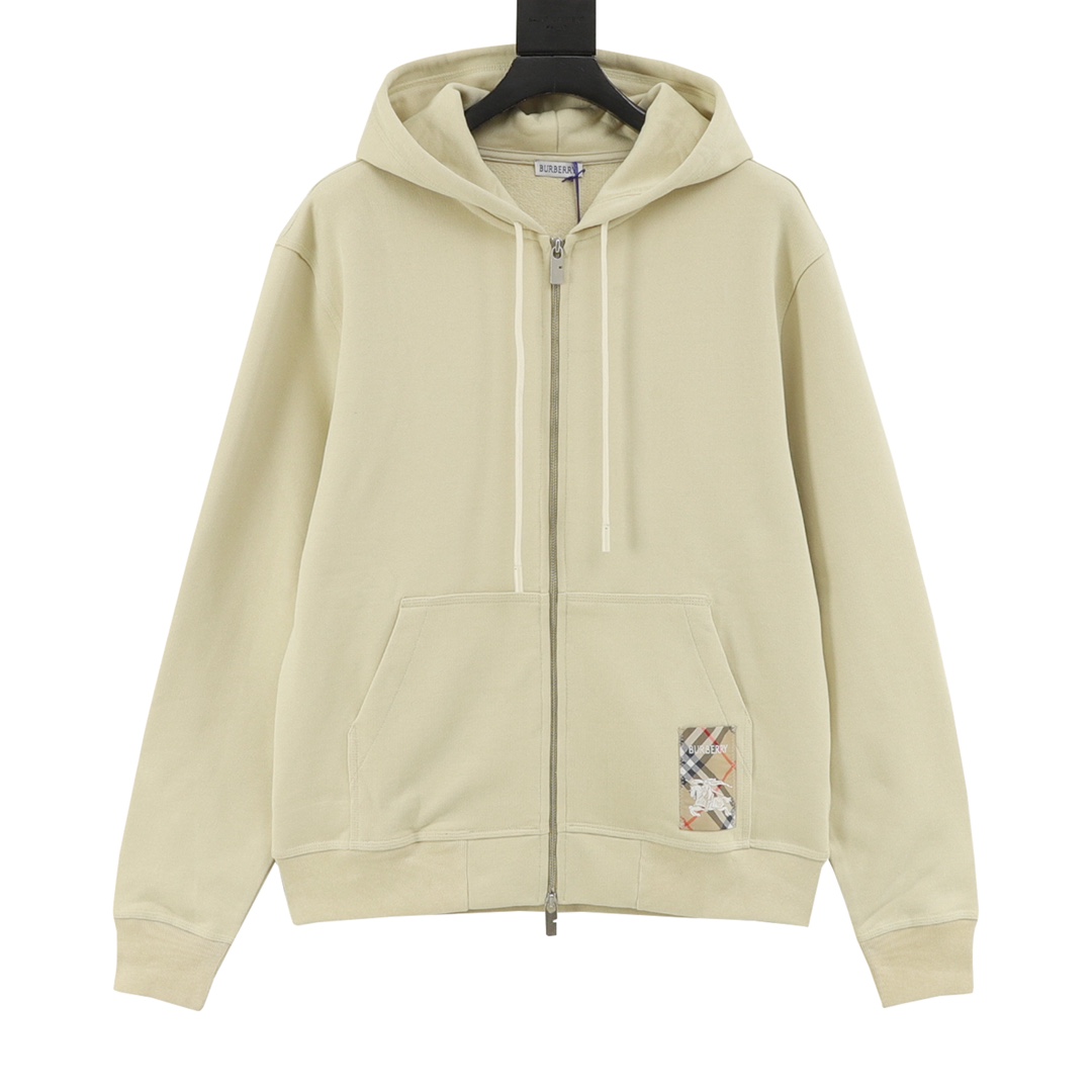 La chaqueta con cremallera y parche a cuadros de Burberry/Burberry está confeccionada con un tejido ligero de algodón a…
