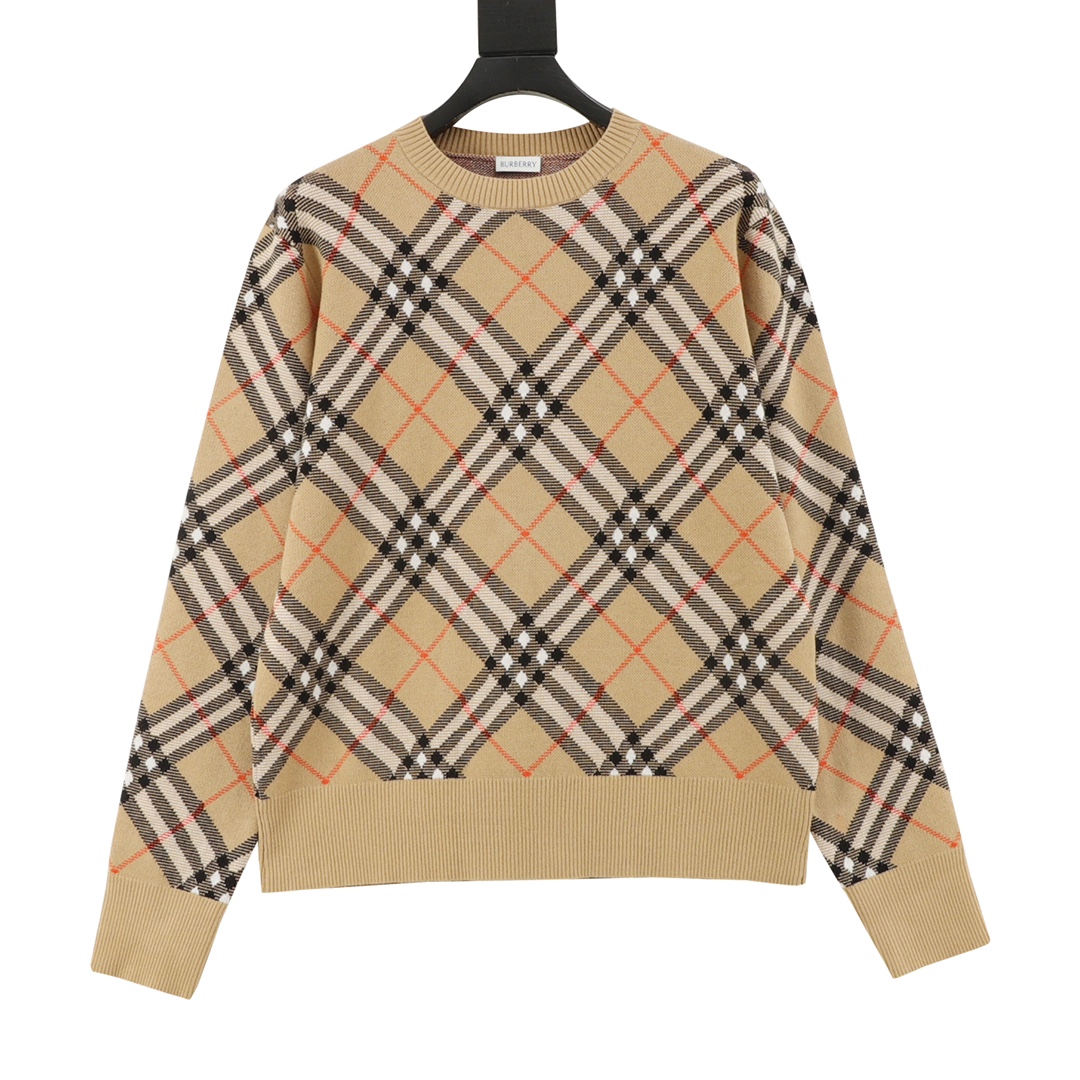 El nuevo suéter de cuello redondo de mezcla de lana a cuadros de sarga de Burberry/Burberry está confeccionado con tela…