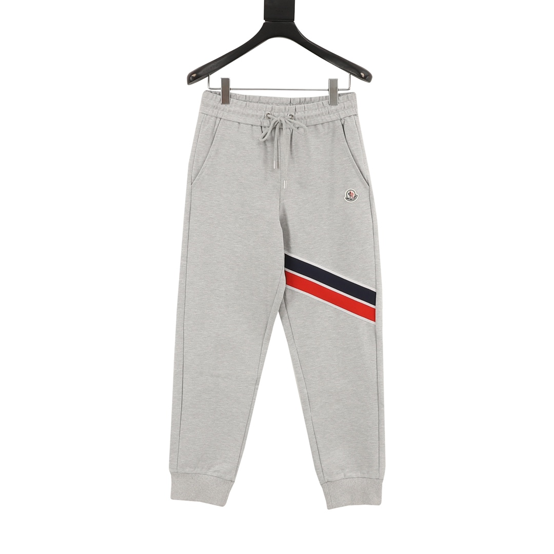 Moncler/Montclair 25Fw Pantalón de conjunto con insignia de logotipo y cinta tejida roja y azul. Estos pantalones de co…