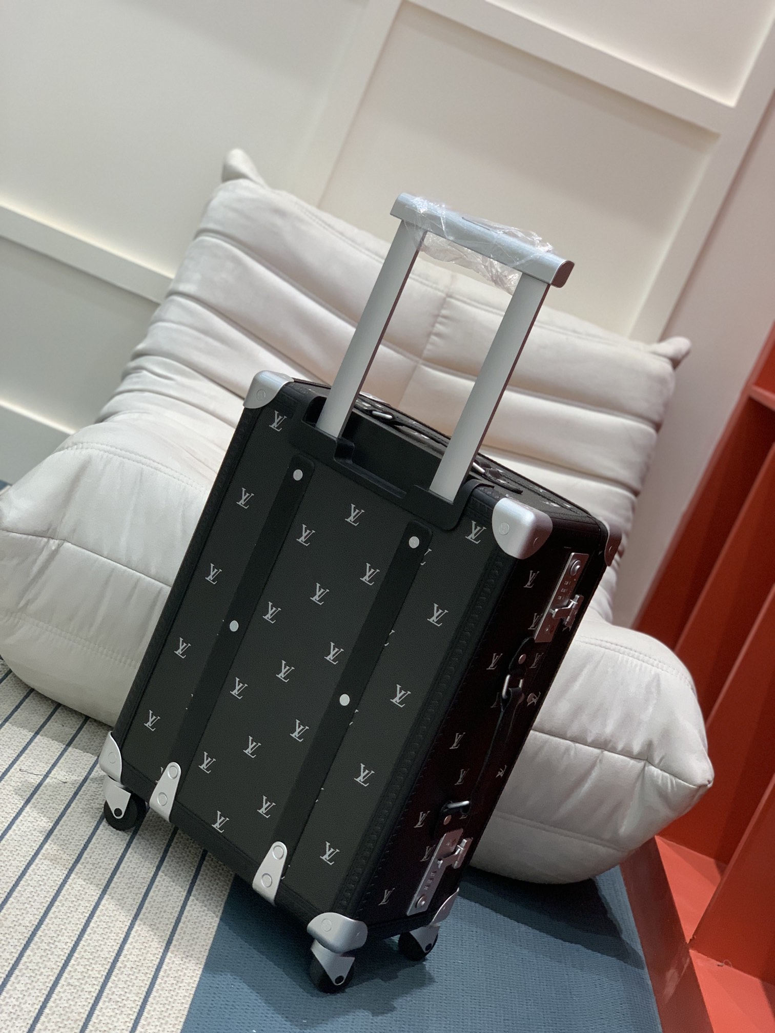 [Trolley Cases]RollingTrunk trolley case is made of Monogram canvas and leathe