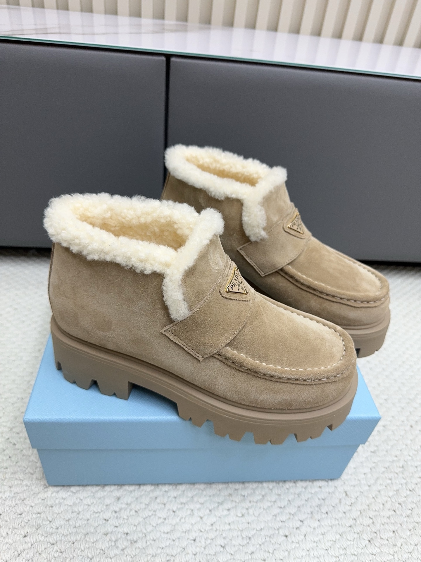 Prada Beige Fuzzy Cuff Ankle Boots