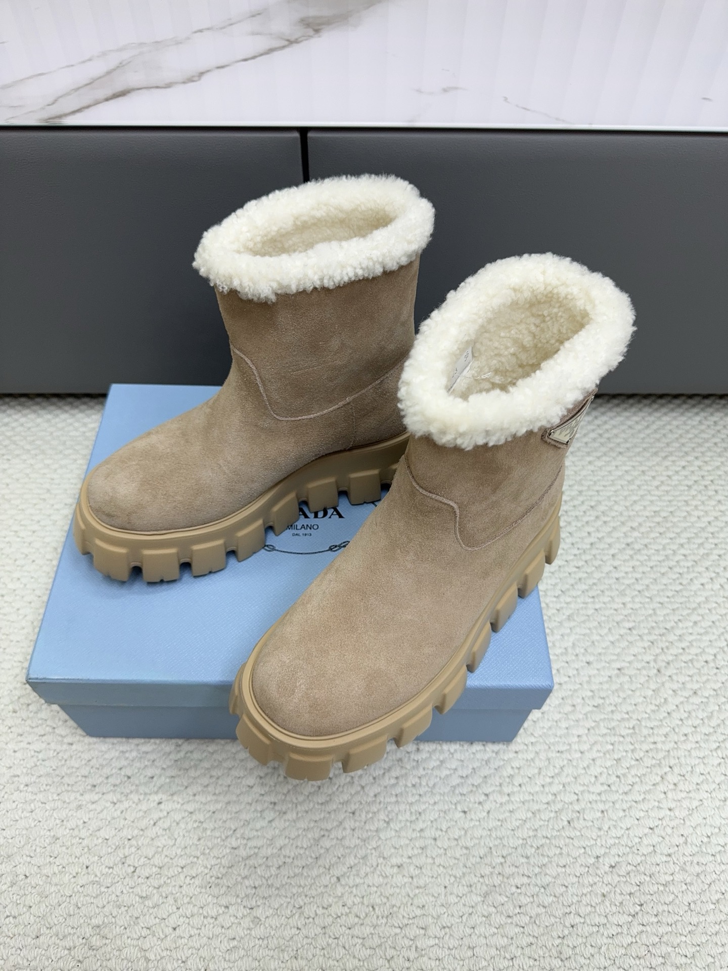 Prada Beige Fuzzy Cuff Ankle Boots