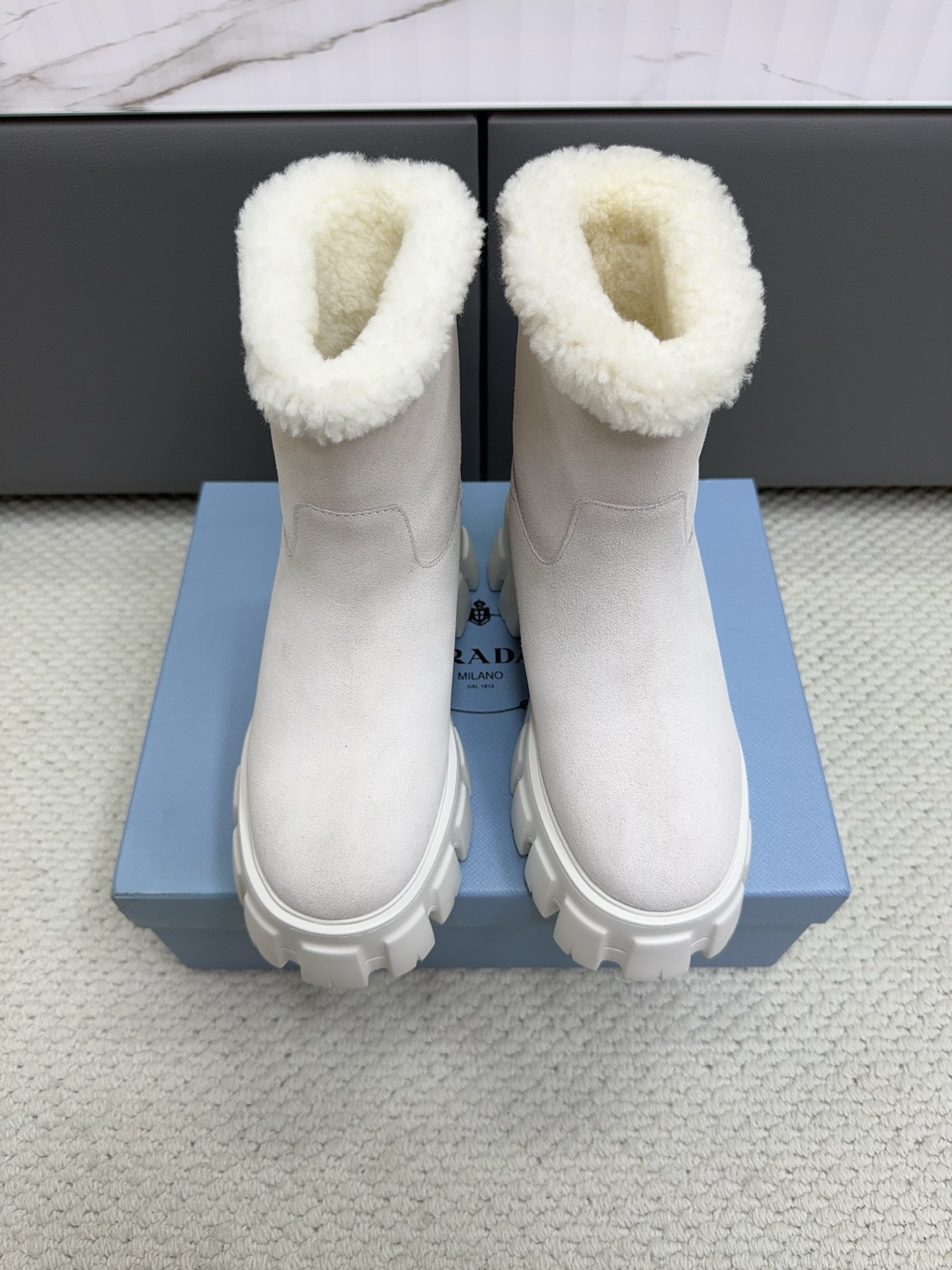 Prada White Fuzzy Cuff Ankle Boots
