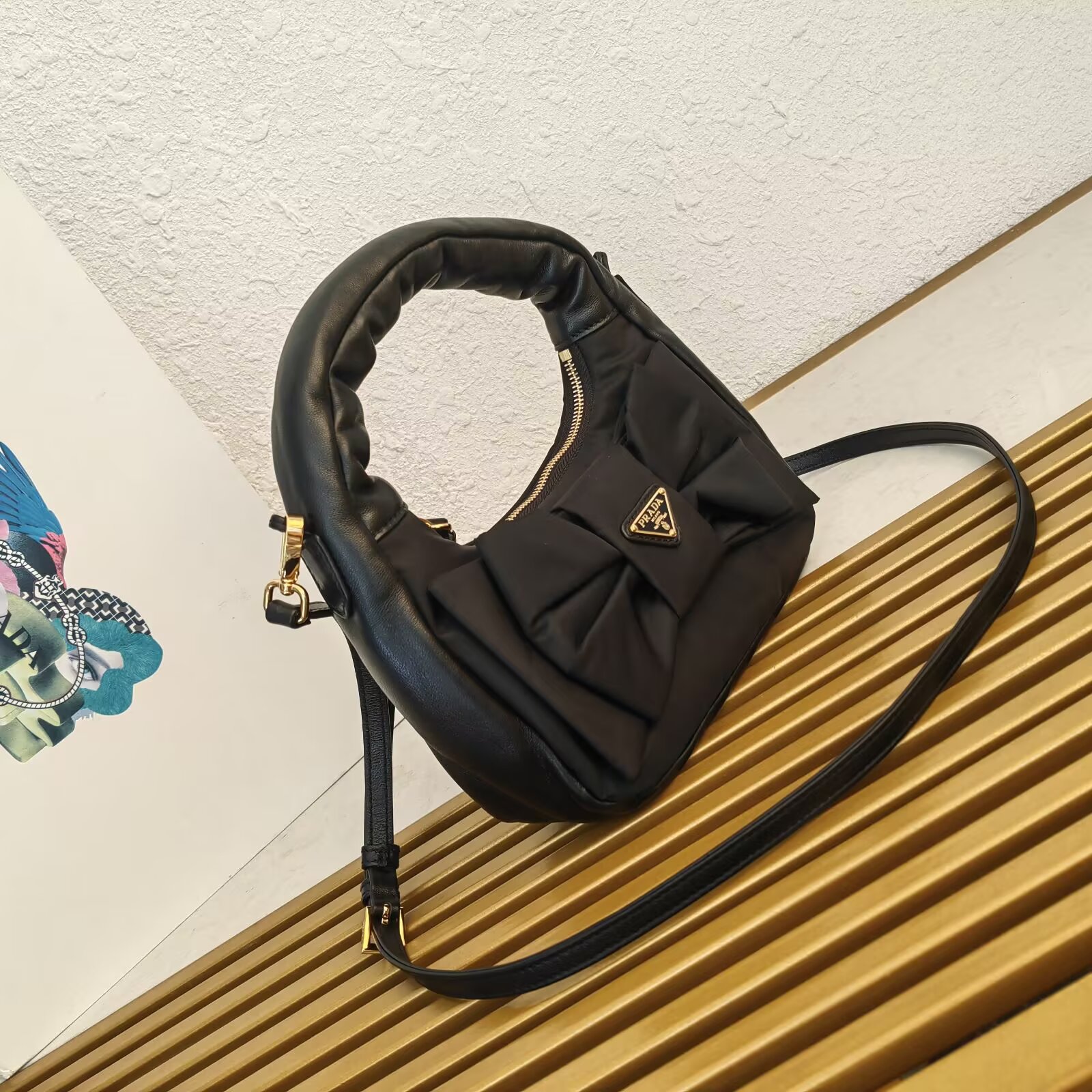 Prada Re-Nylon and Nappa Leather Mini Hobo Bag with Oversized Bow 3 a1745212569859 6128
