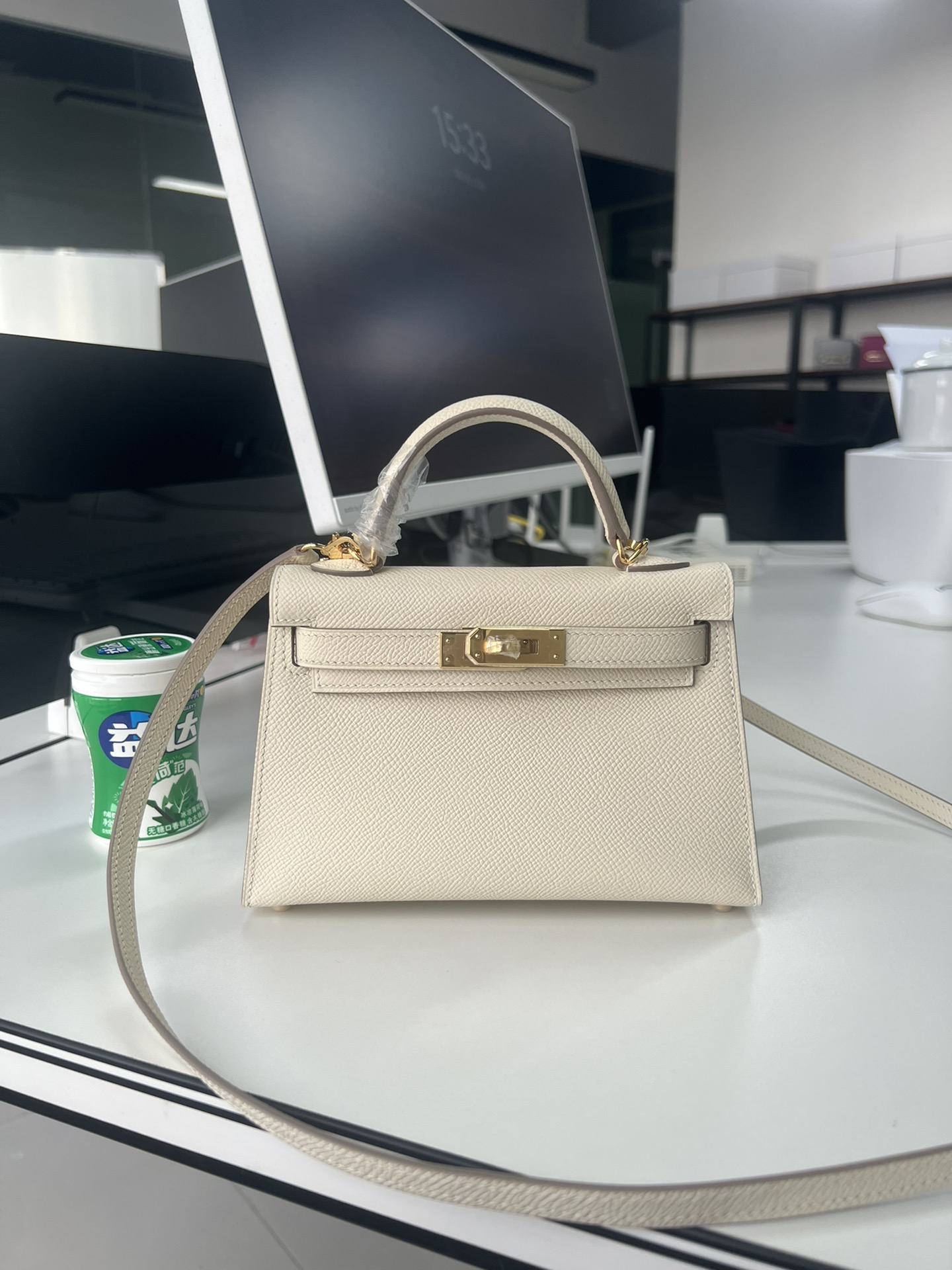 Hermès Second generation Mini Kelly 19cm waxed Epsom leather milkshake white gold and silver