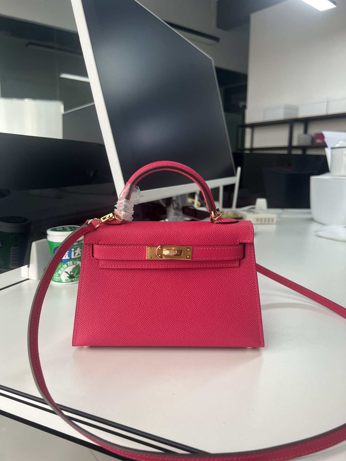 Hermès Second generation Mini Kelly 19cm waxed Epsom leather bright pink gold and silver