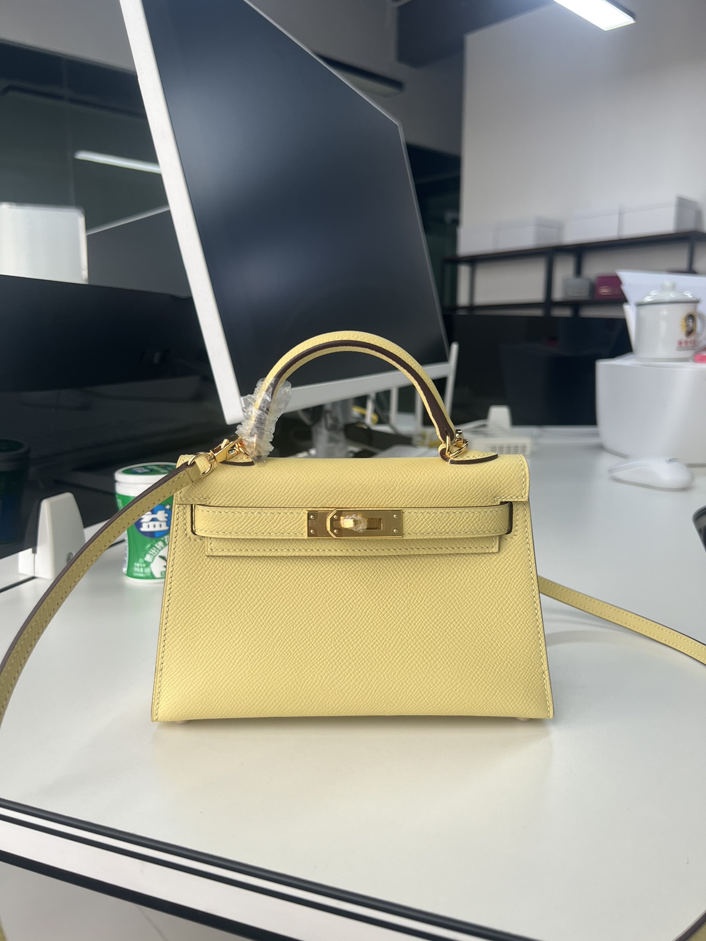 Hermès Second generation Mini Kelly 19cm waxed Epsom leather chick yellow gold and silver