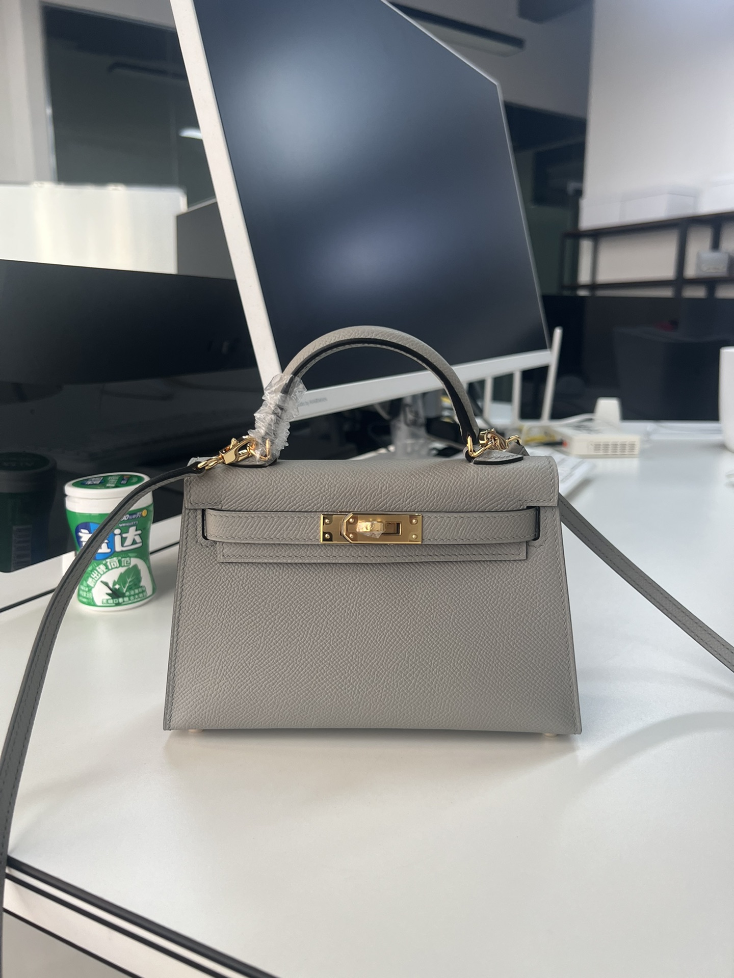 Hermès Second generation Mini Kelly 19cm waxed Epsom leather cumulonimbus gray gold and silver