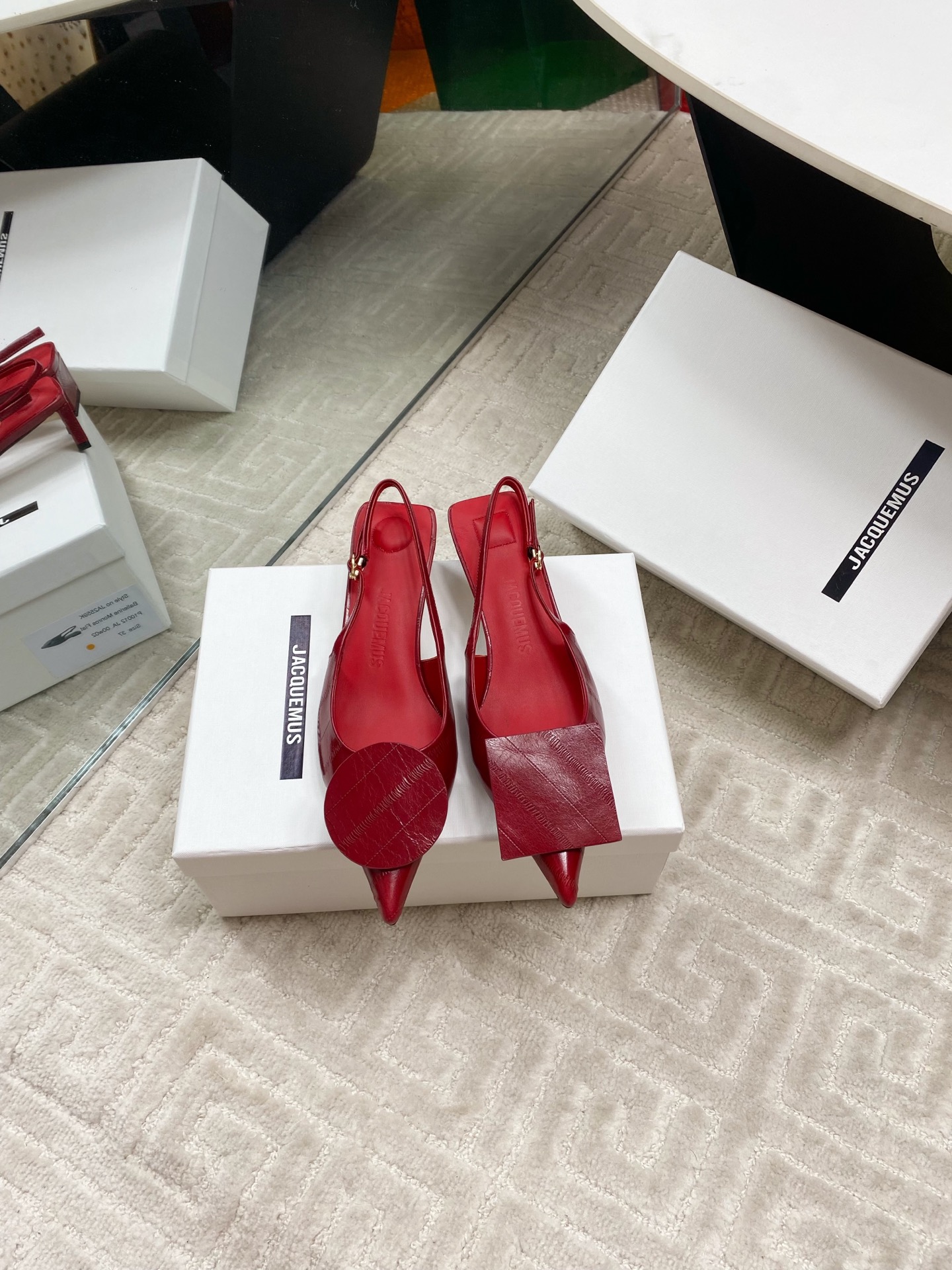 Jacquemus Red Leather Slingback Heels with Asymmetric Buckle Detail 3 i1744813748563 4380 0 0
