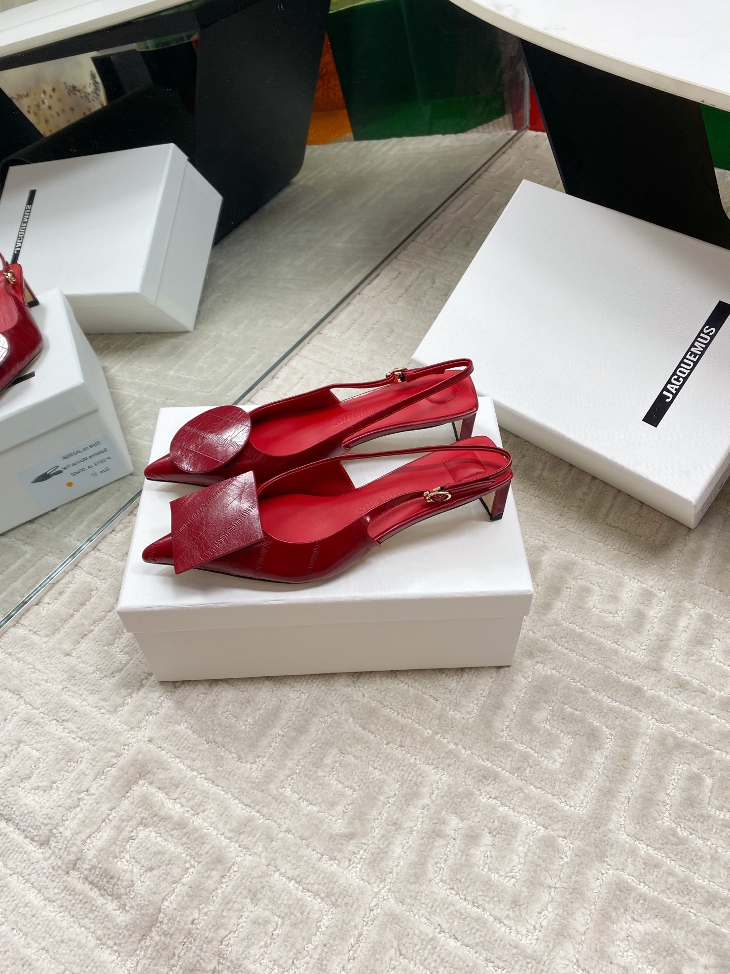 Jacquemus Red Leather Slingback Heels with Asymmetric Buckle Detail 2 i1744813748597 8042 0 1