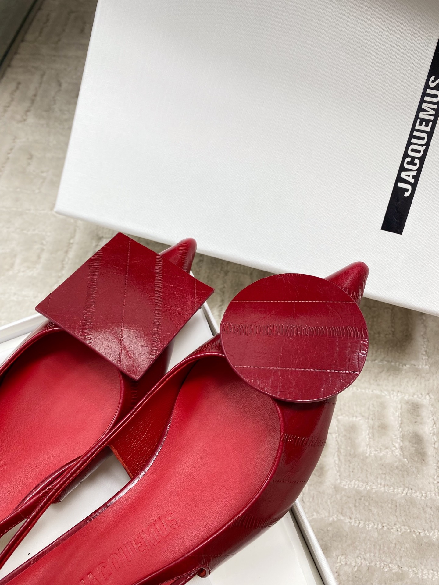 Jacquemus Red Leather Slingback Heels with Asymmetric Buckle Detail 8 i1744813748604 9614 0 6