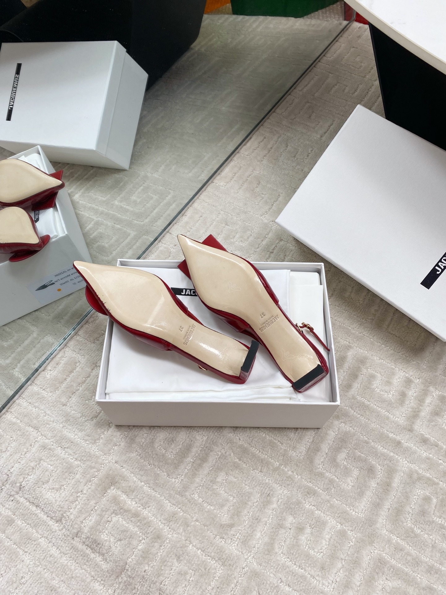 Jacquemus Red Leather Slingback Heels with Asymmetric Buckle Detail 10 i1744813749676 401 0 8